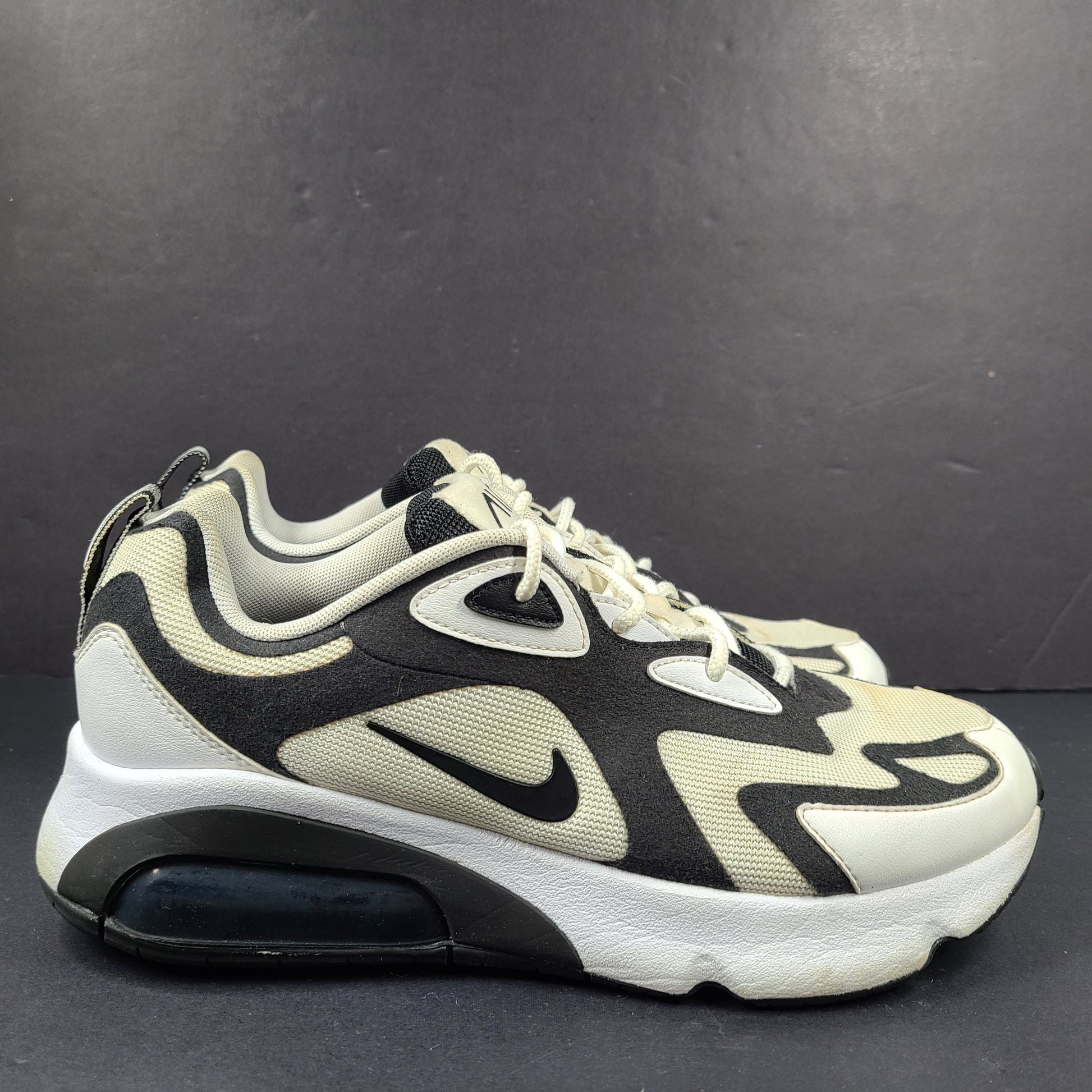 Nike Air Max 200 in black, white and beige with light sole wear and US size 9.5.