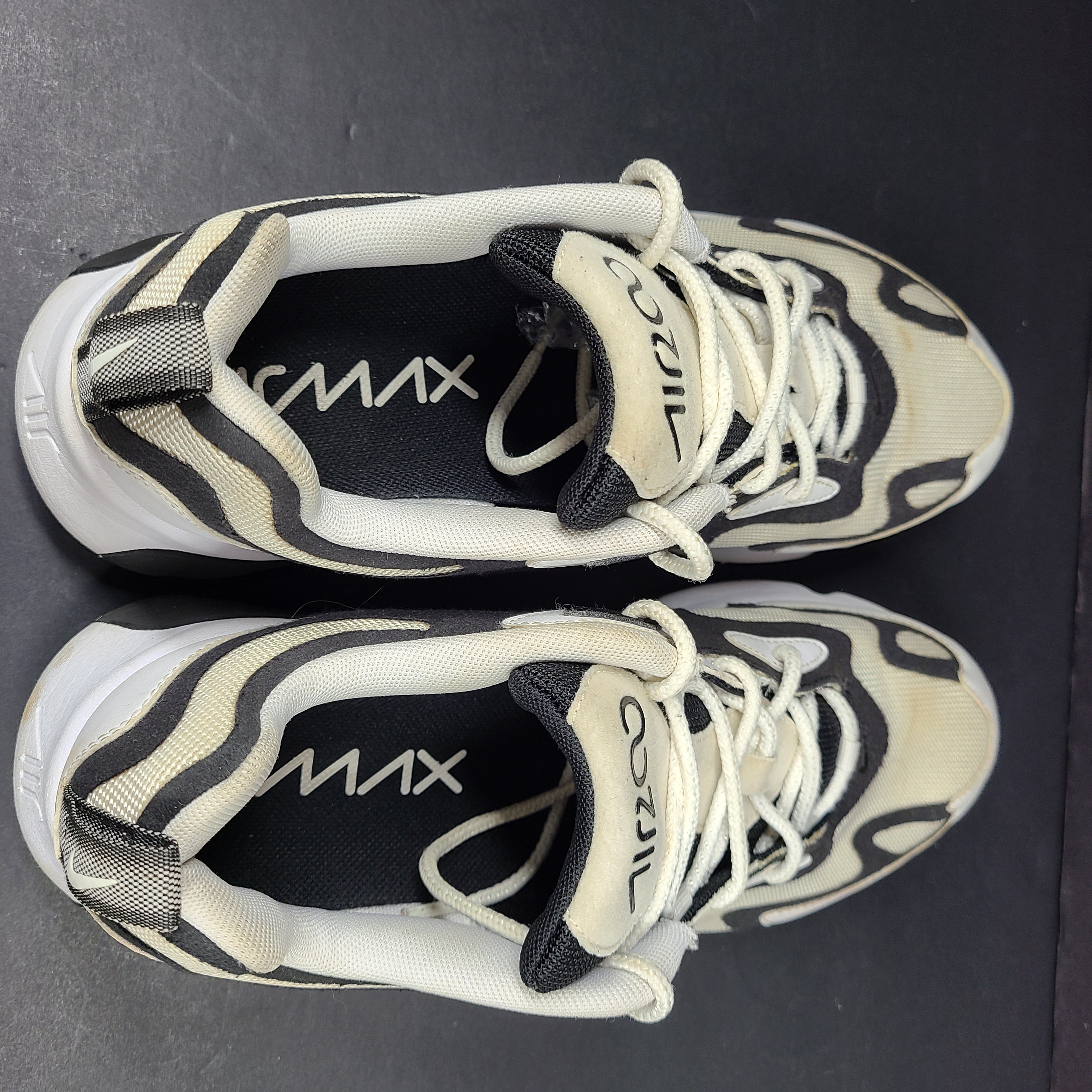 Nike Air Max 200 in black, white and beige with light sole wear and US size 9.5.