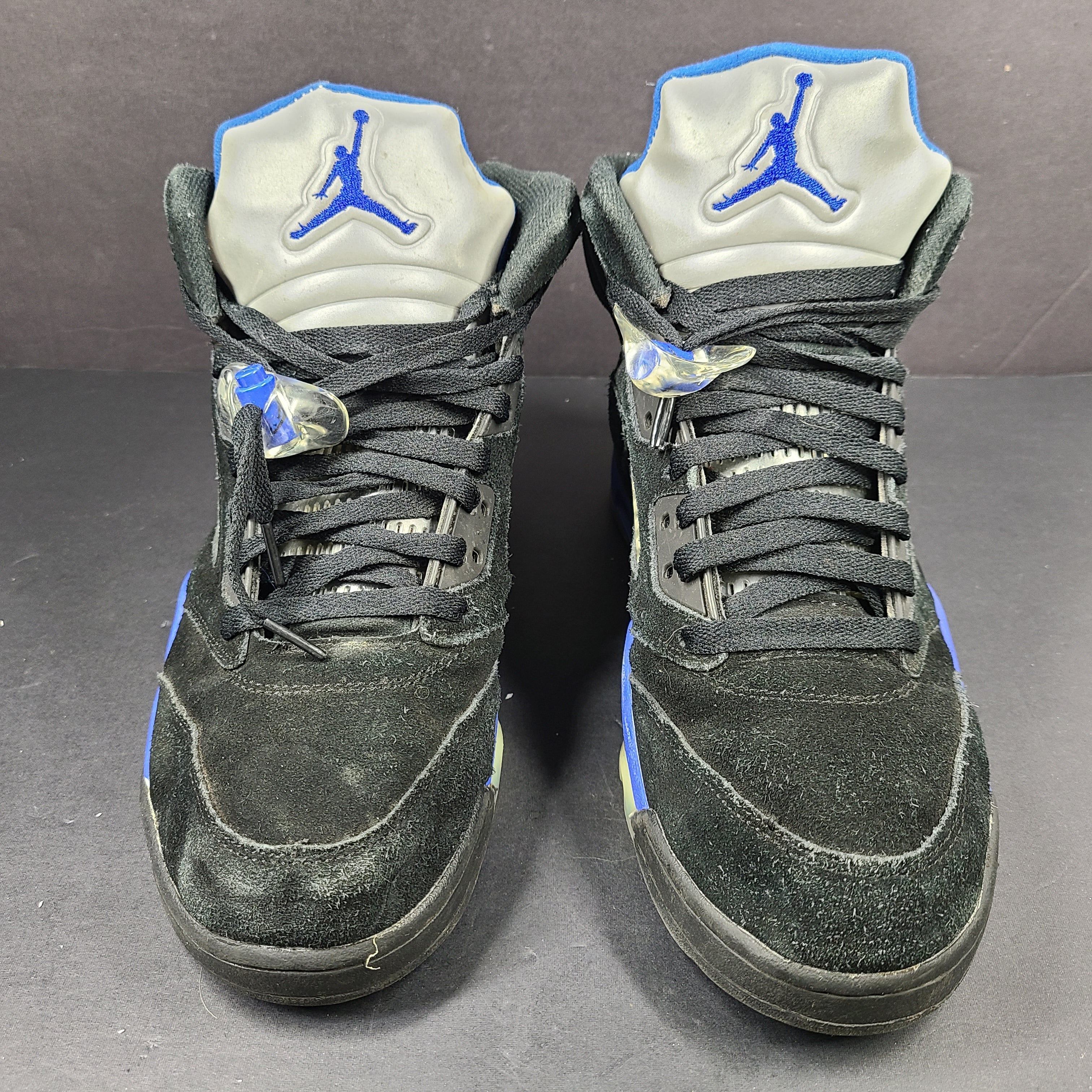 Nike Air Jordan 5 Retro Racer Blue sneakers in black and racer blue, UK 10 with Air Jordan branding on heel and tongue.