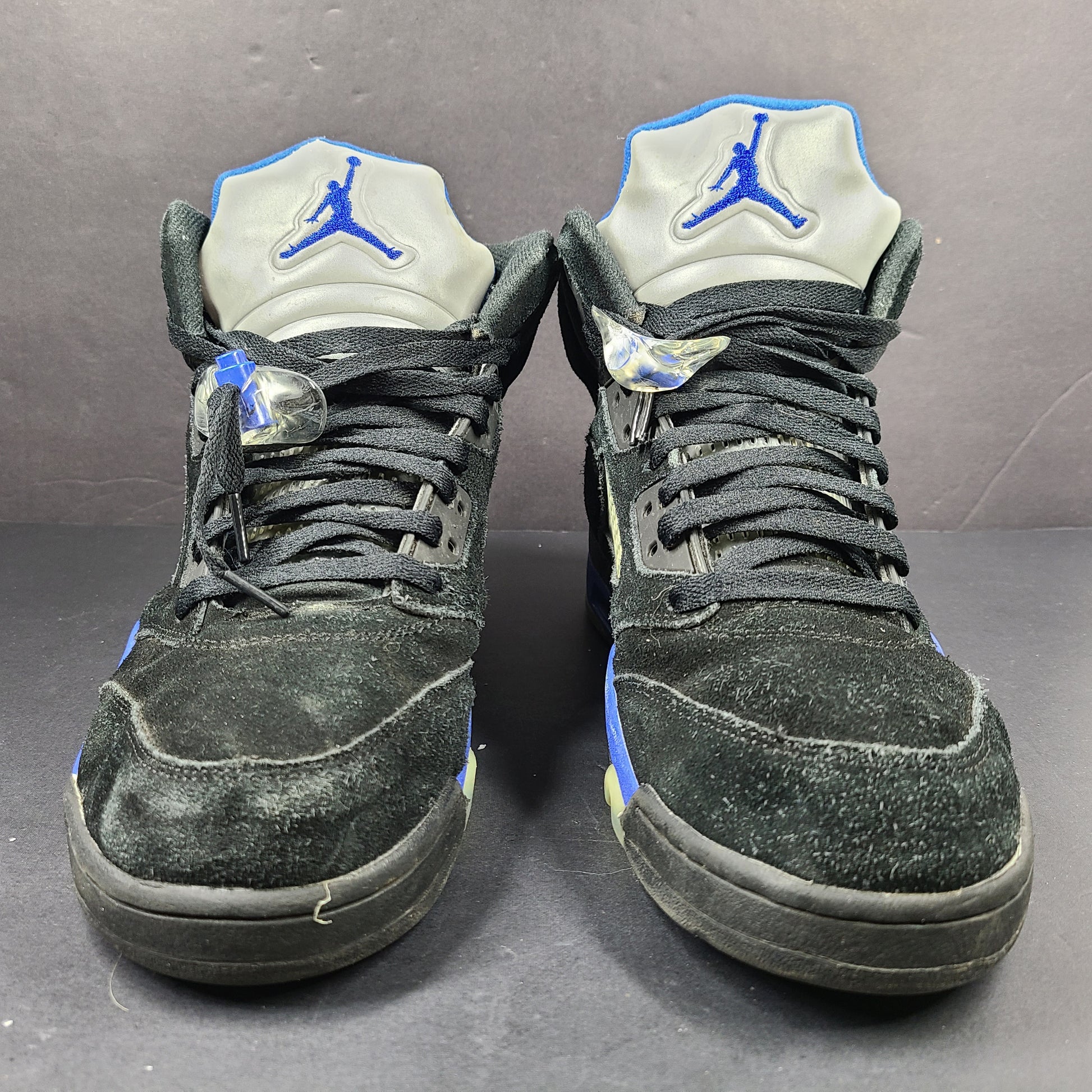 Nike Air Jordan 5 Retro Racer Blue sneakers in black and racer blue, UK 10 with Air Jordan branding on heel and tongue.