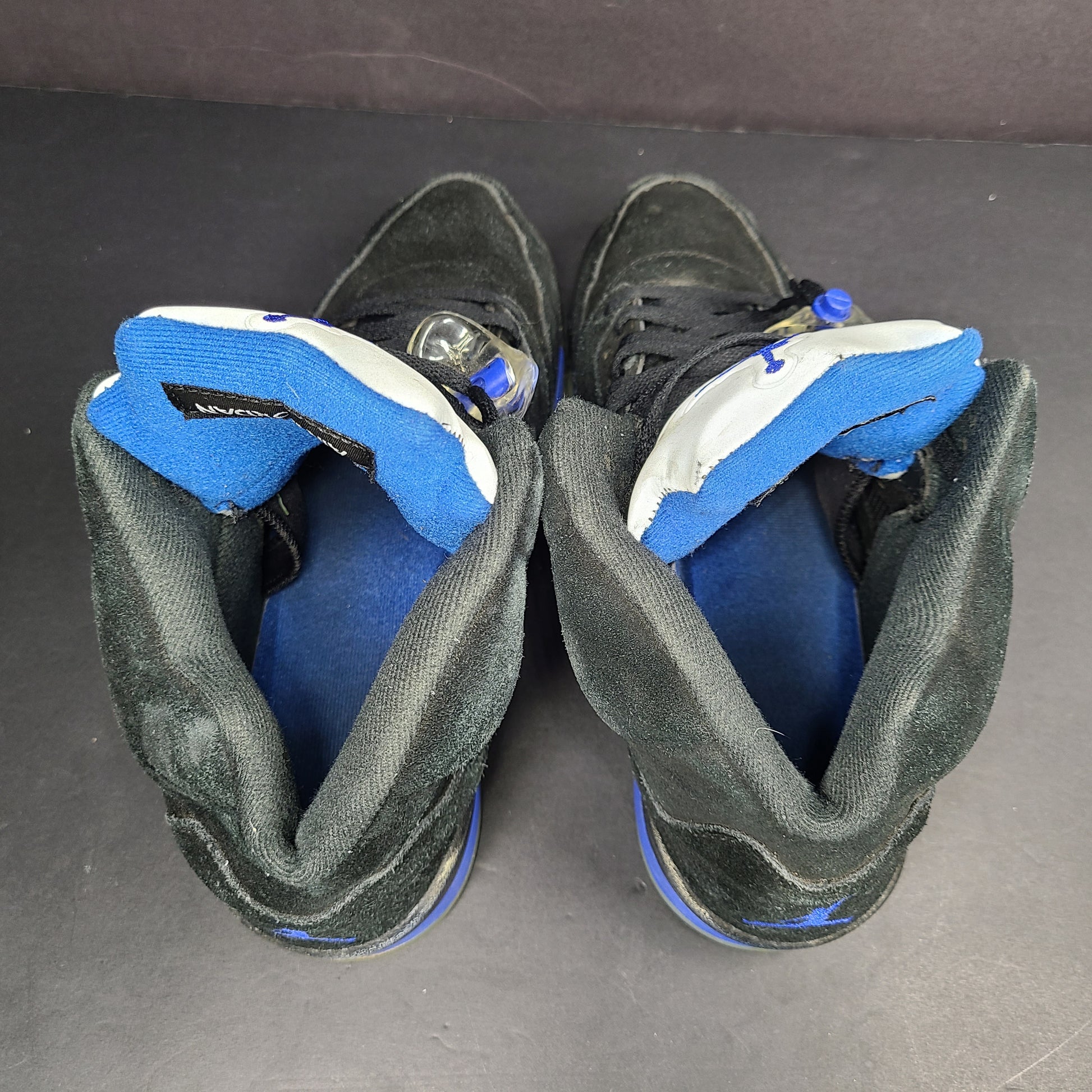 Nike Air Jordan 5 Retro Racer Blue sneakers in black and racer blue, UK 10 with Air Jordan branding on heel and tongue.