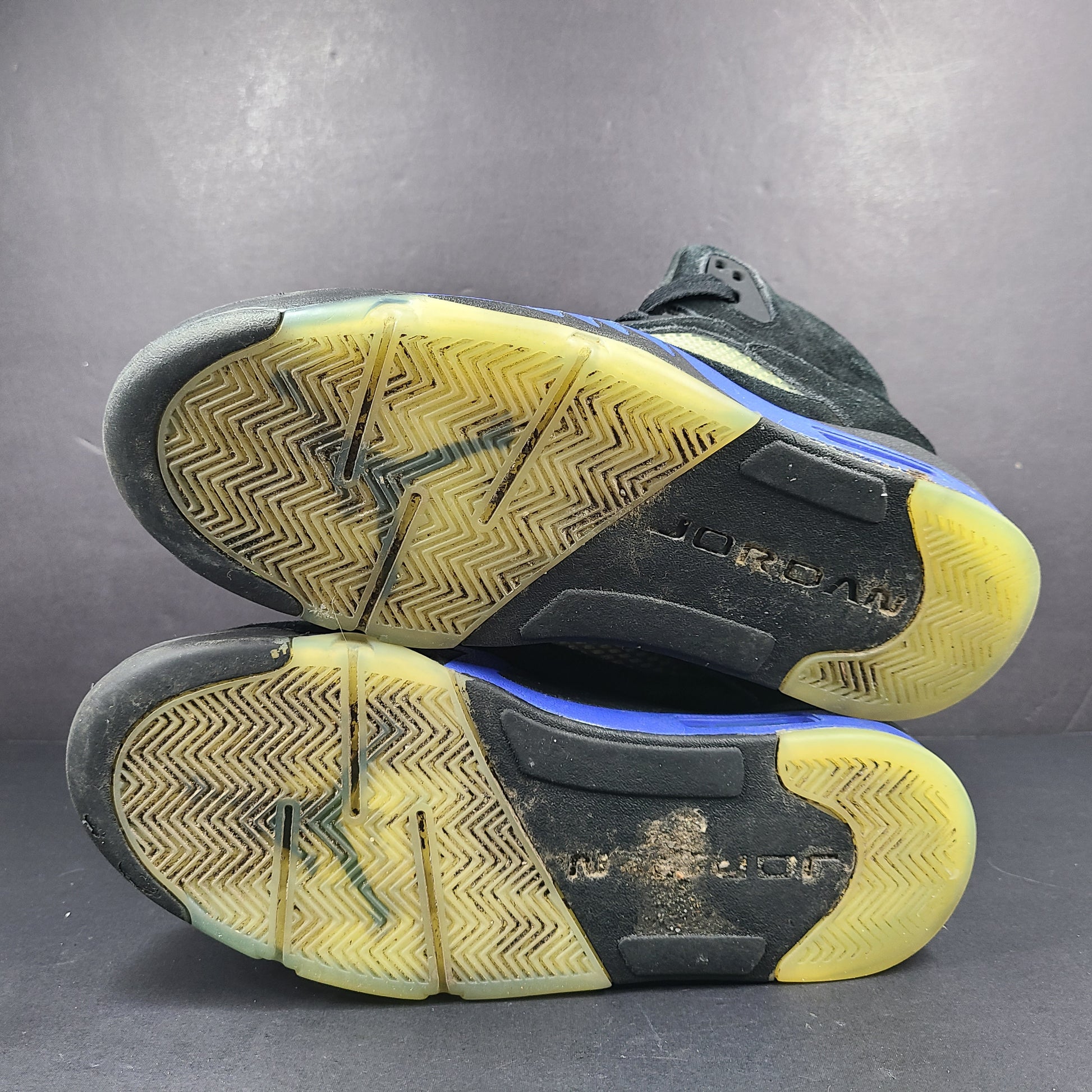 Nike Air Jordan 5 Retro Racer Blue sneakers in black and racer blue, UK 10 with Air Jordan branding on heel and tongue.