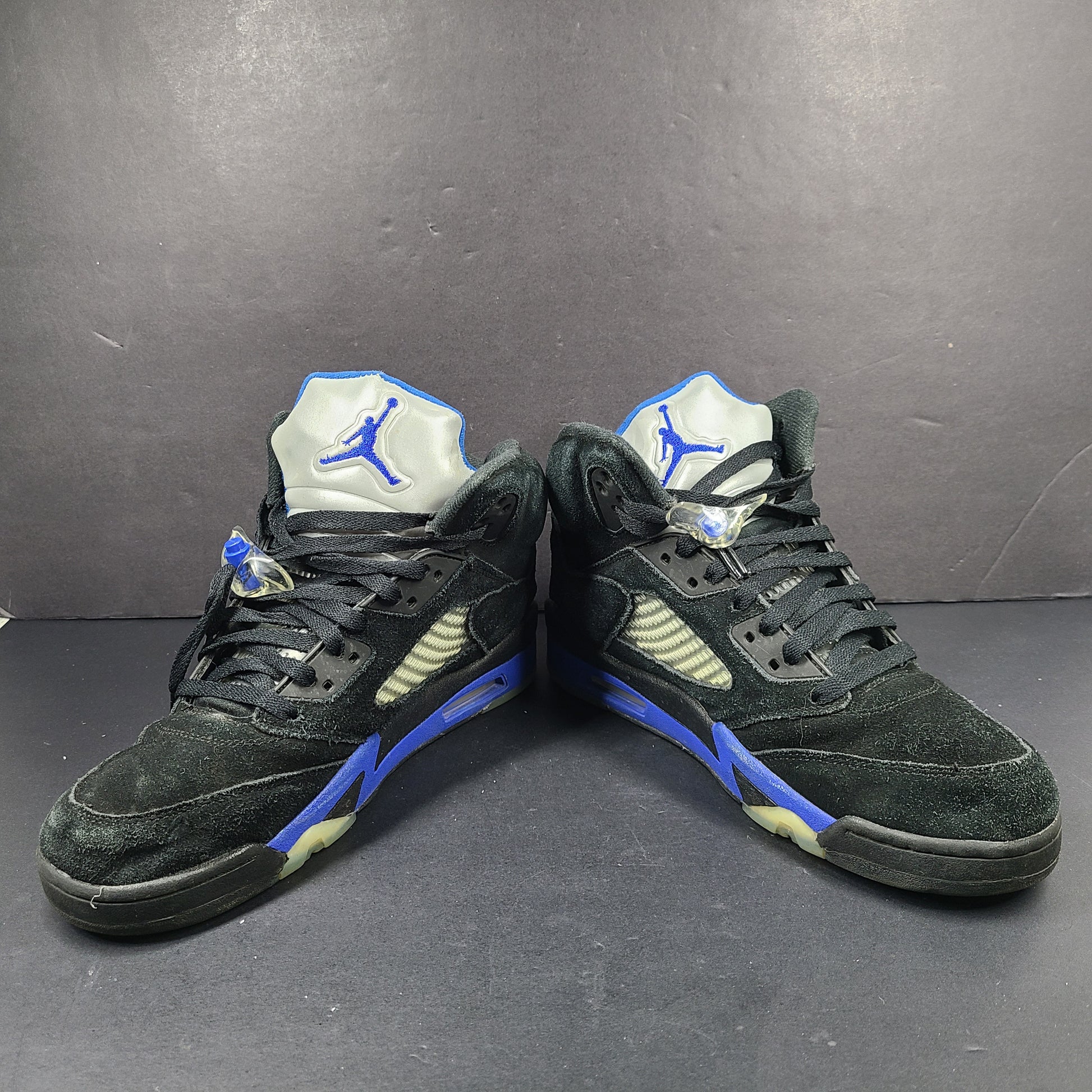 Nike Air Jordan 5 Retro Racer Blue sneakers in black and racer blue, UK 10 with Air Jordan branding on heel and tongue.