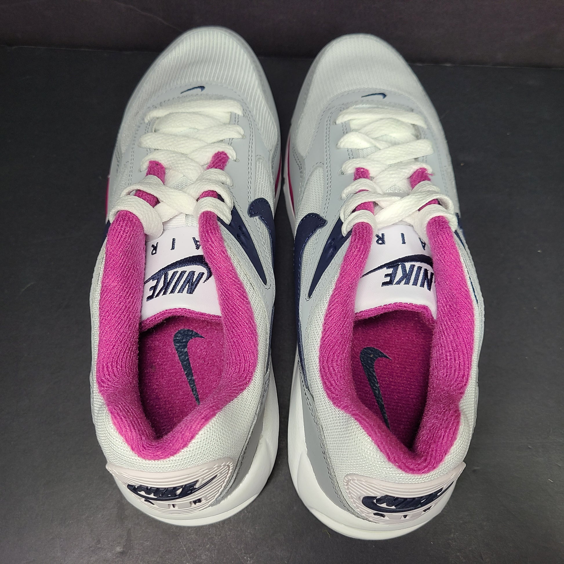White, grey and pink Nike Air Max Correlate women's sneaker in US size 7.5 with Air Max cushioning.