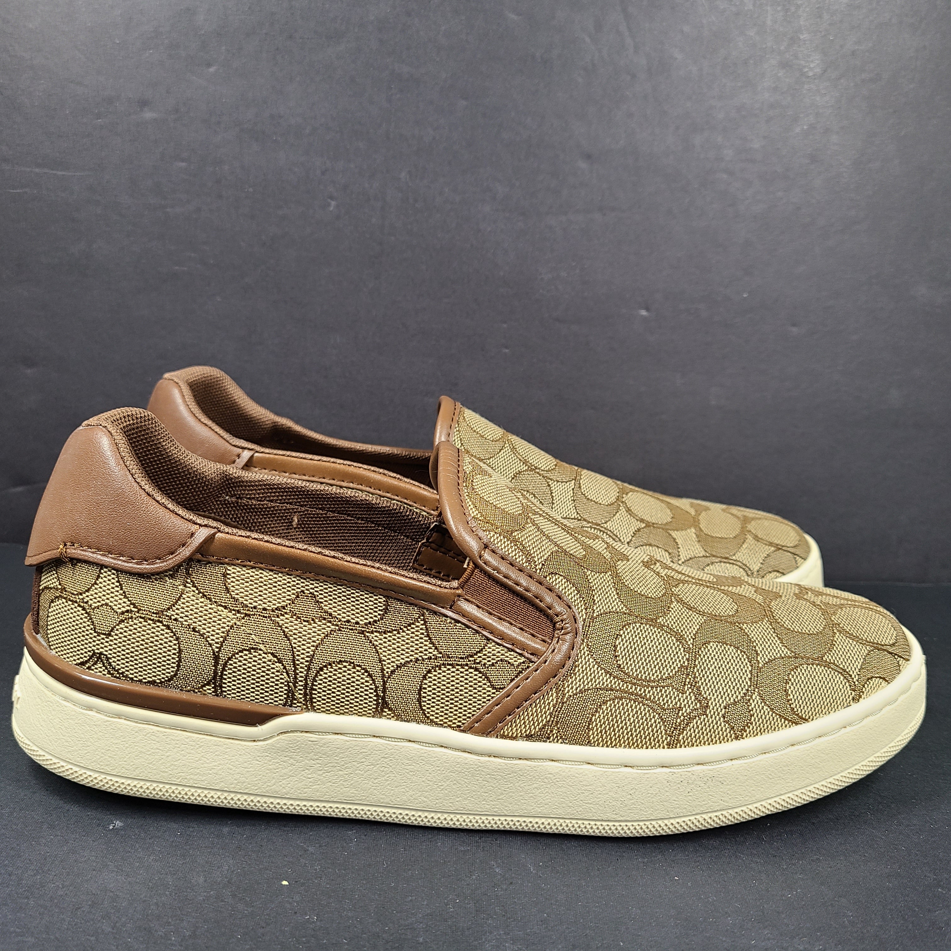 Coach slip-on sneakers model C4393 in brown, size 6.5B, designed for everyday wear.