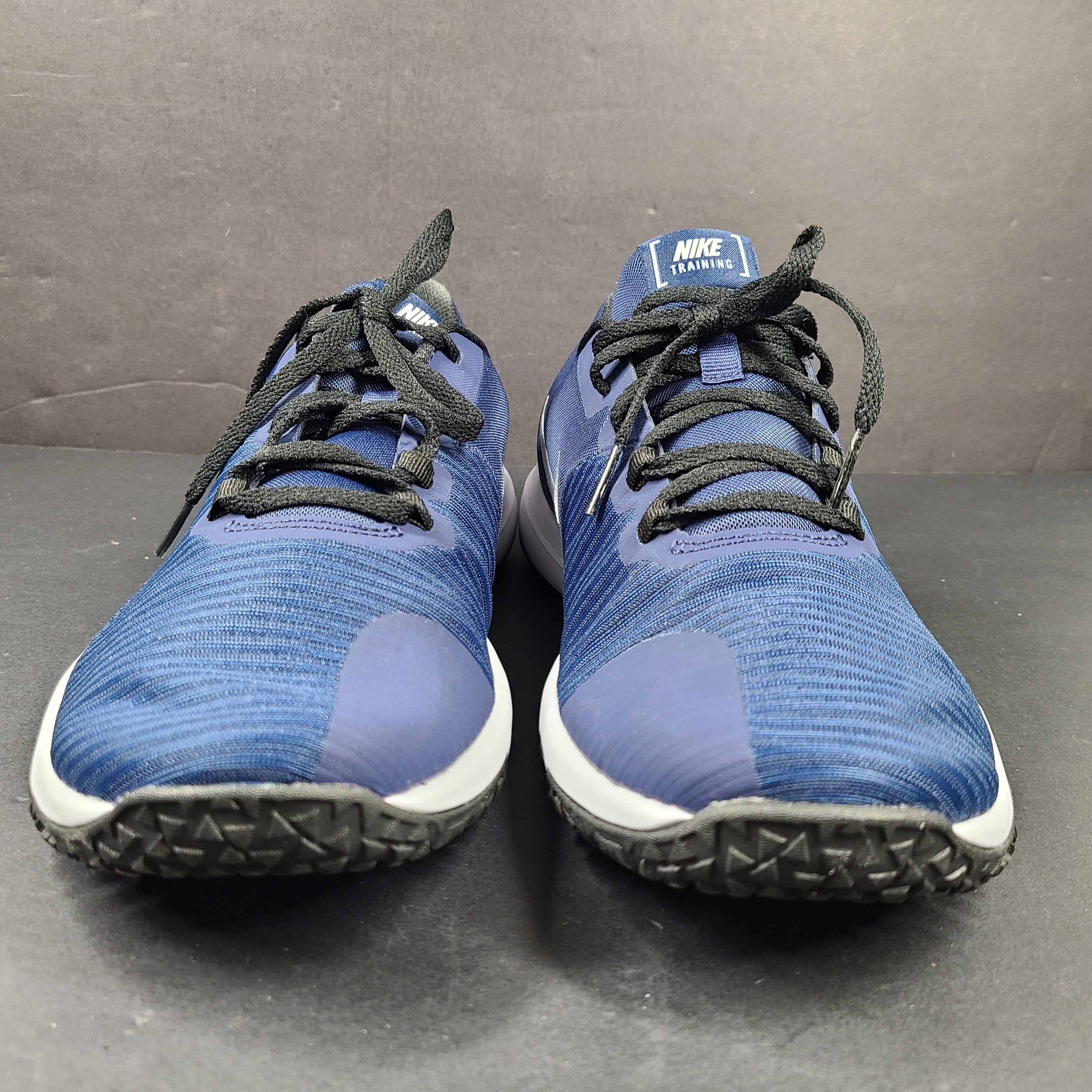 Men's Nike Flex Control 4 training shoe in blue, black, and white, US size 9, designed for stable, lightweight workouts.