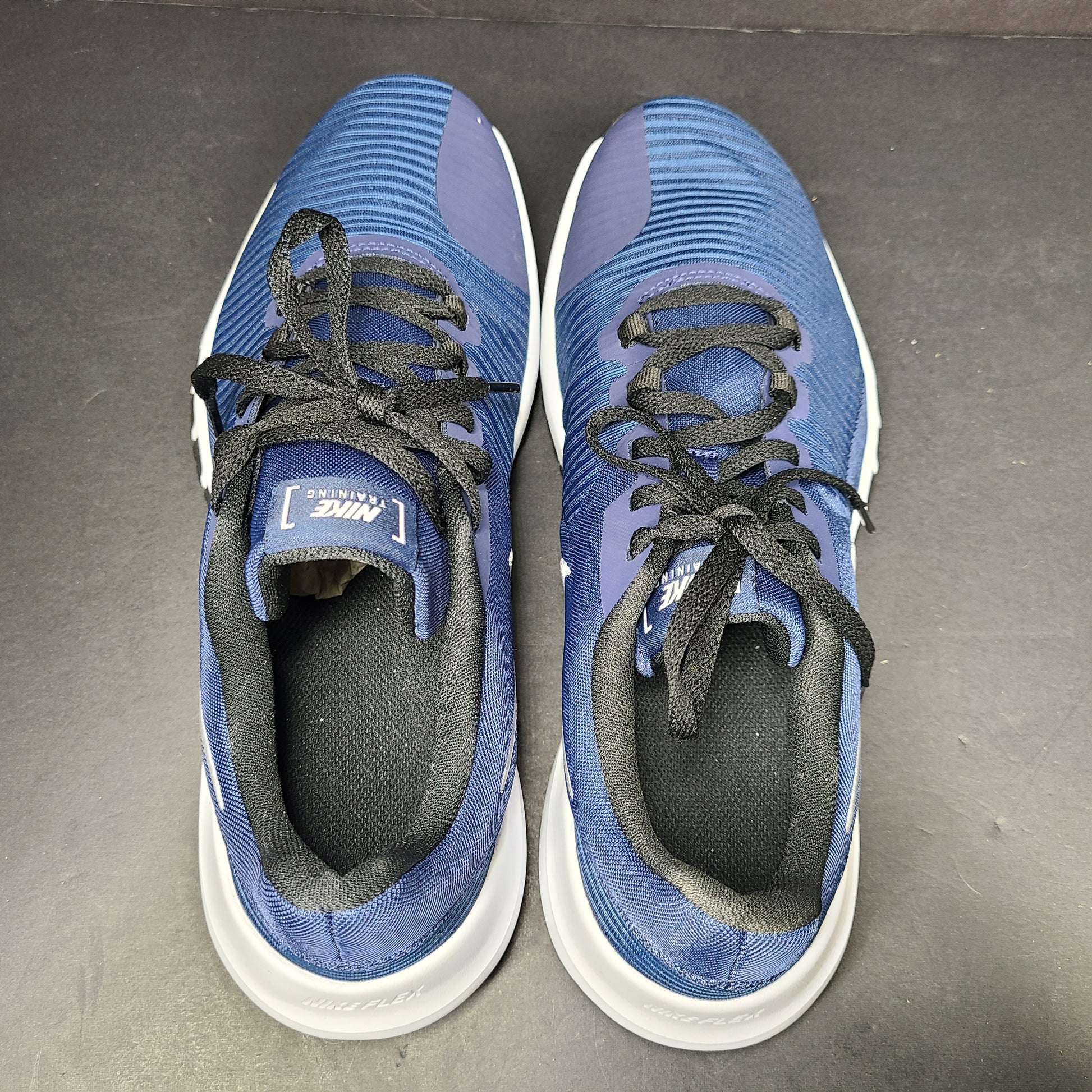 Men's Nike Flex Control 4 training shoe in blue, black, and white, US size 9, designed for stable, lightweight workouts.