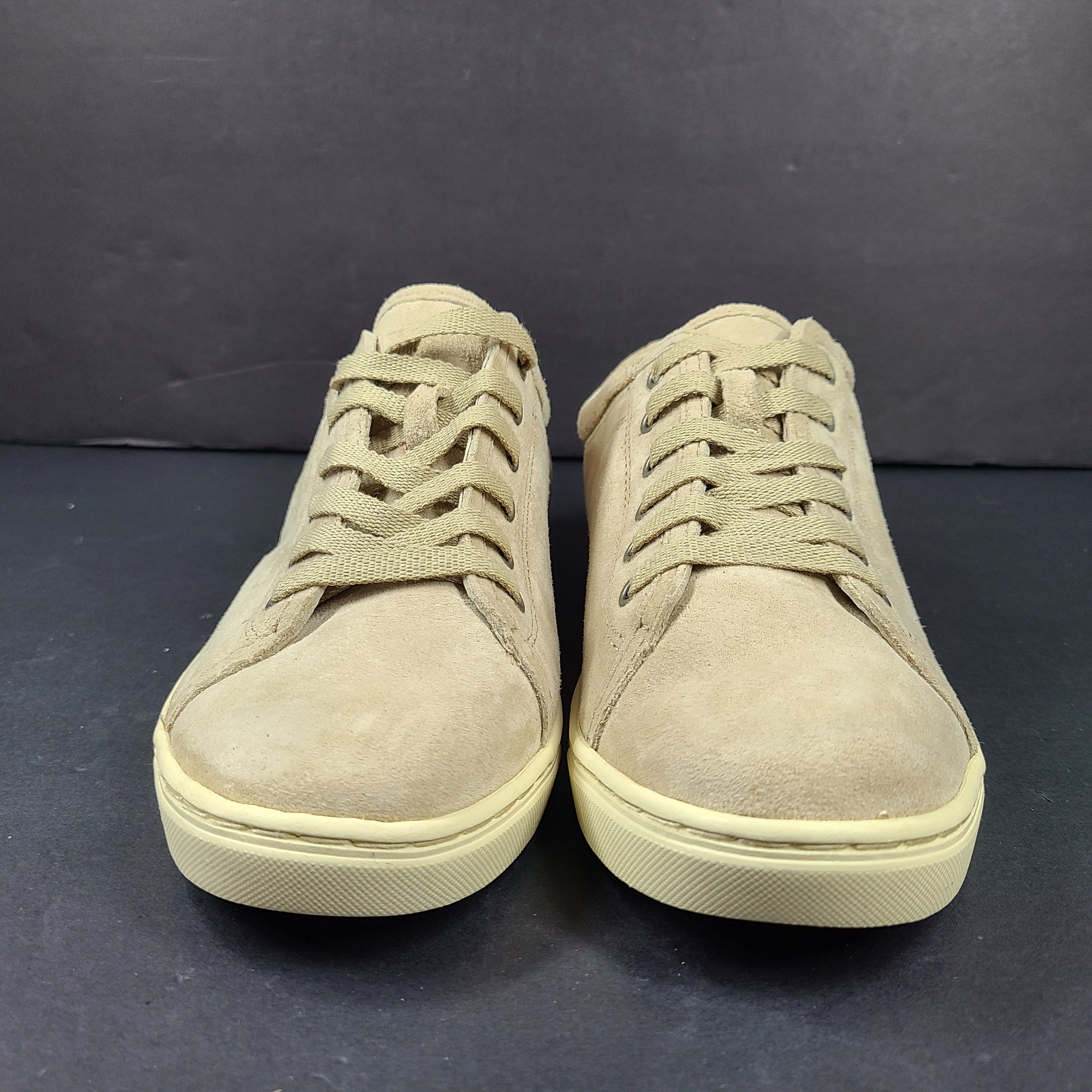 Beige UGG Tomi suede low-top sneakers in US size 7.5 designed for casual comfort.
