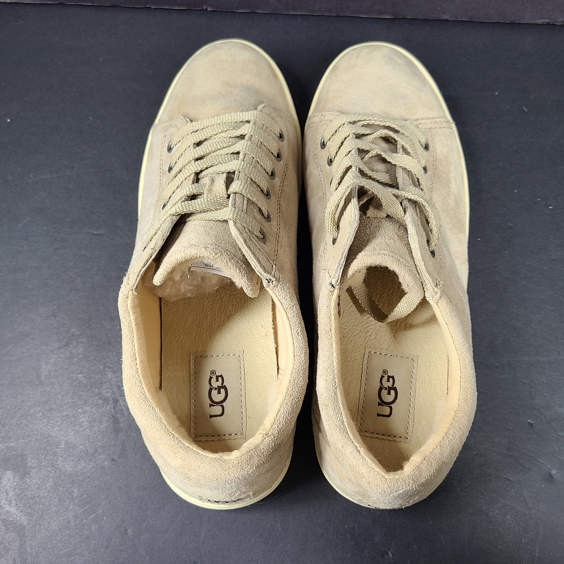 Beige UGG Tomi suede low-top sneakers in US size 7.5 designed for casual comfort.
