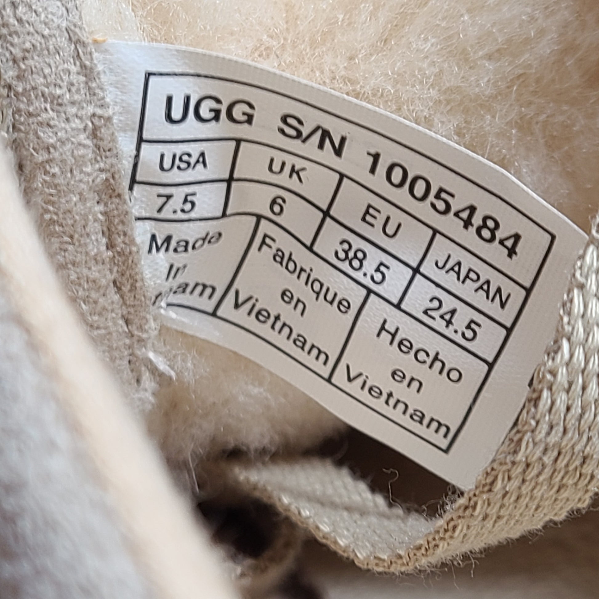 Beige UGG Tomi suede low-top sneakers in US size 7.5 designed for casual comfort.