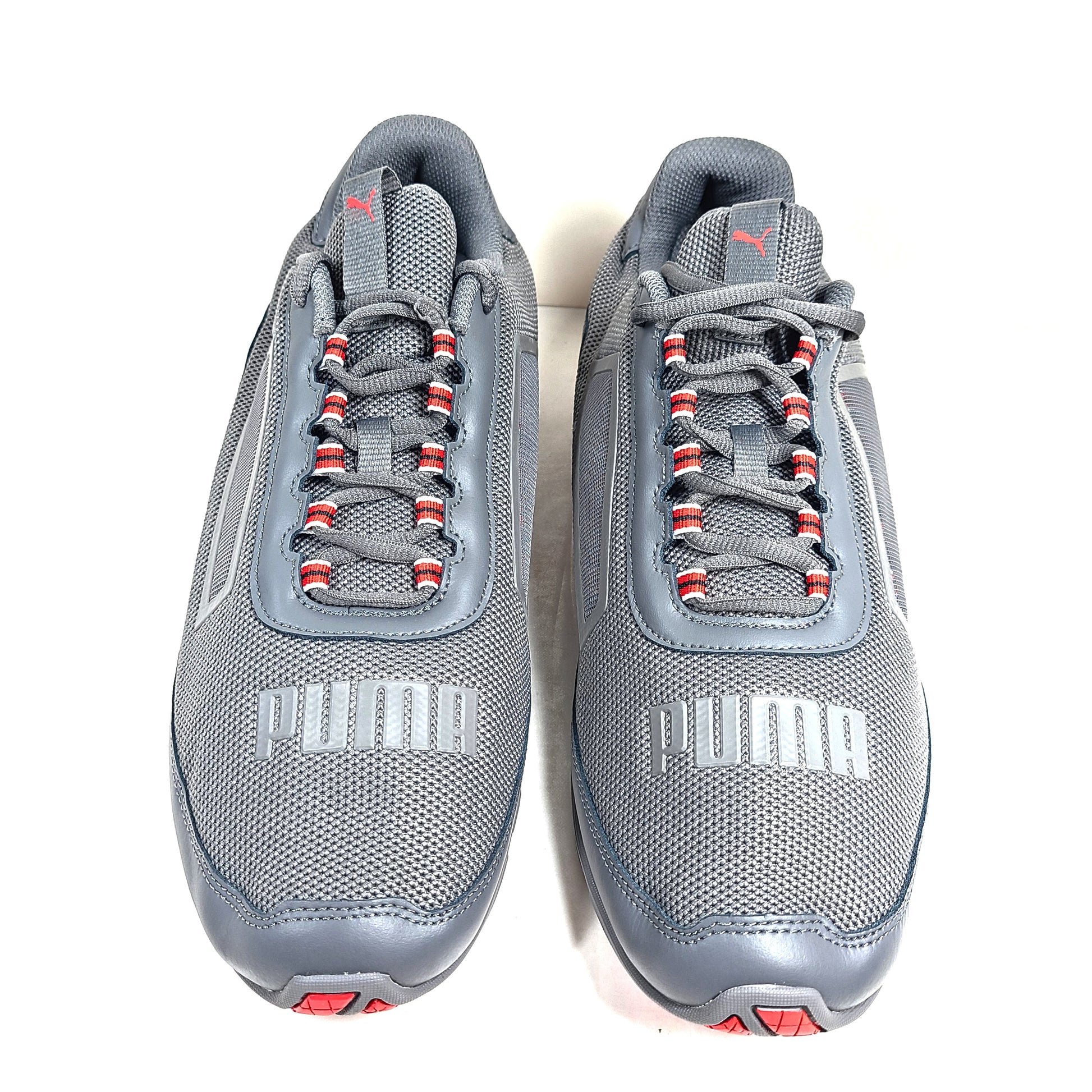 Grey and red Puma Cell Regulate NX sneakers with Soft Foam+ cushioning and an athletic profile.