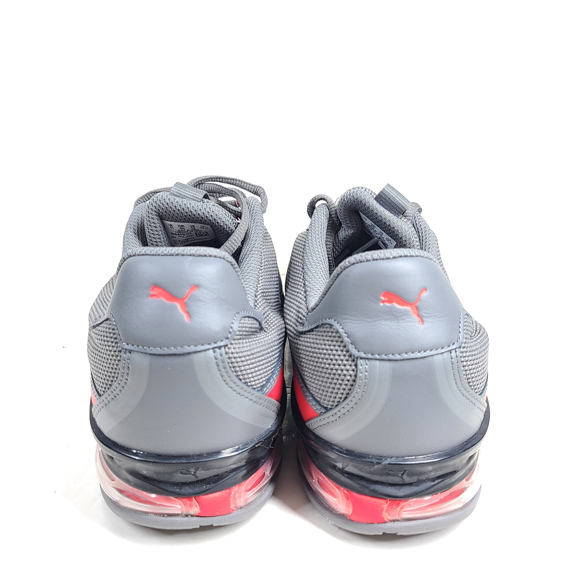 Grey and red Puma Cell Regulate NX sneakers with Soft Foam+ cushioning and an athletic profile.
