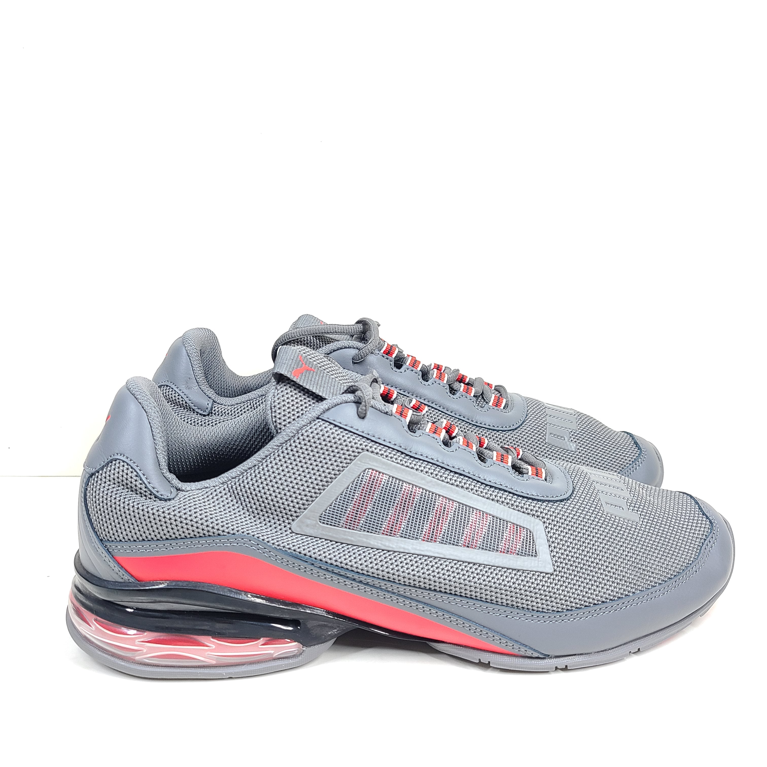 Grey and red Puma Cell Regulate NX sneakers with Soft Foam+ cushioning and an athletic profile.