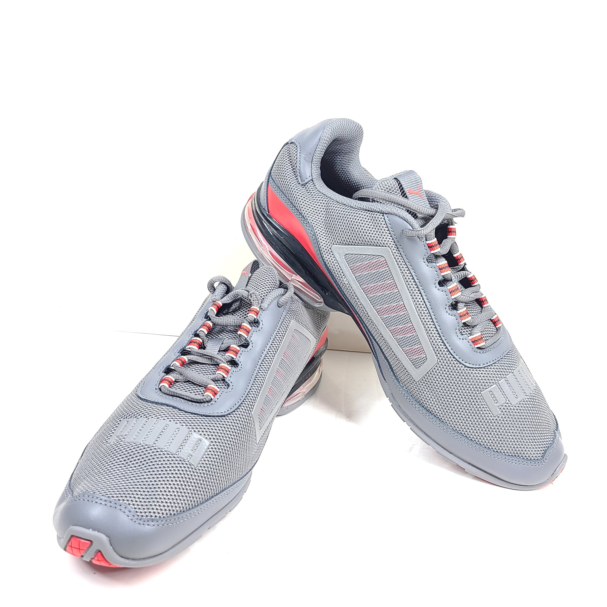Grey and red Puma Cell Regulate NX sneakers with Soft Foam+ cushioning and an athletic profile.