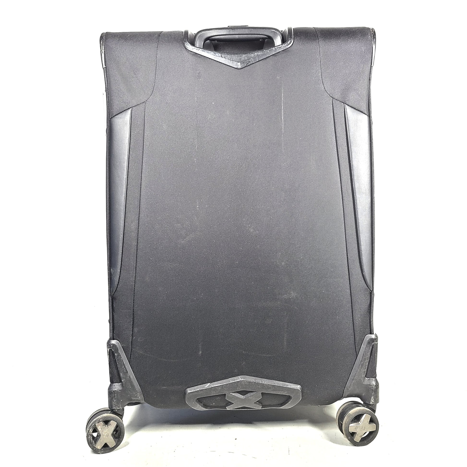 Black Samsonite Spinner 71/26 EXP suitcase with four spinner wheels and a telescoping handle.