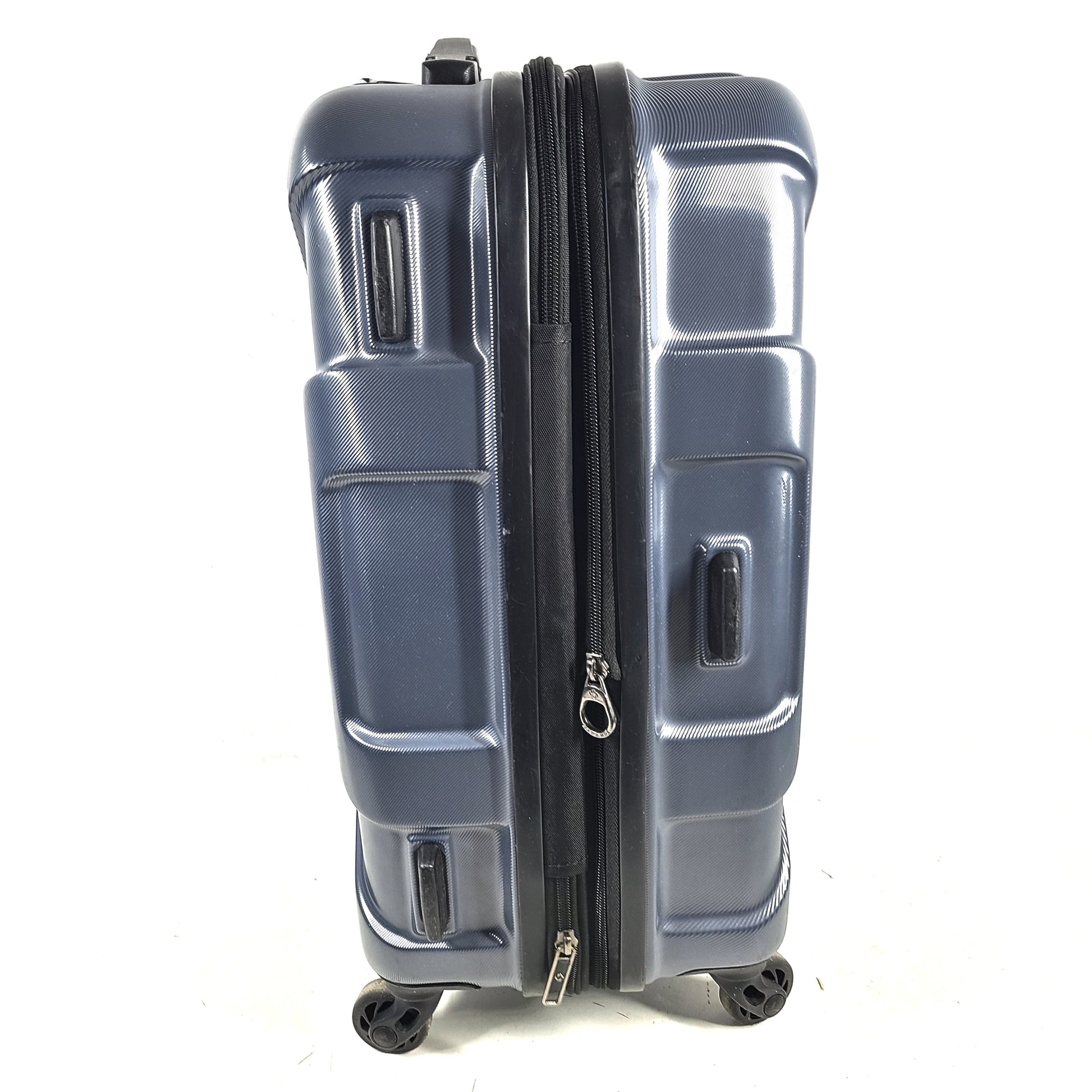 Blue Samsonite 8853 hard-shell spinner suitcase with exterior scuffs and a clean interior.