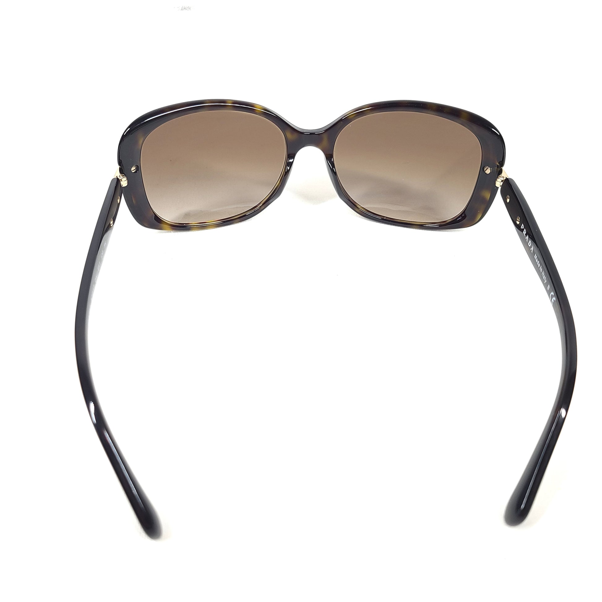Prada SPR 080 tortoise brown butterfly-frame sunglasses with 57-17-130 sizing from Italy.