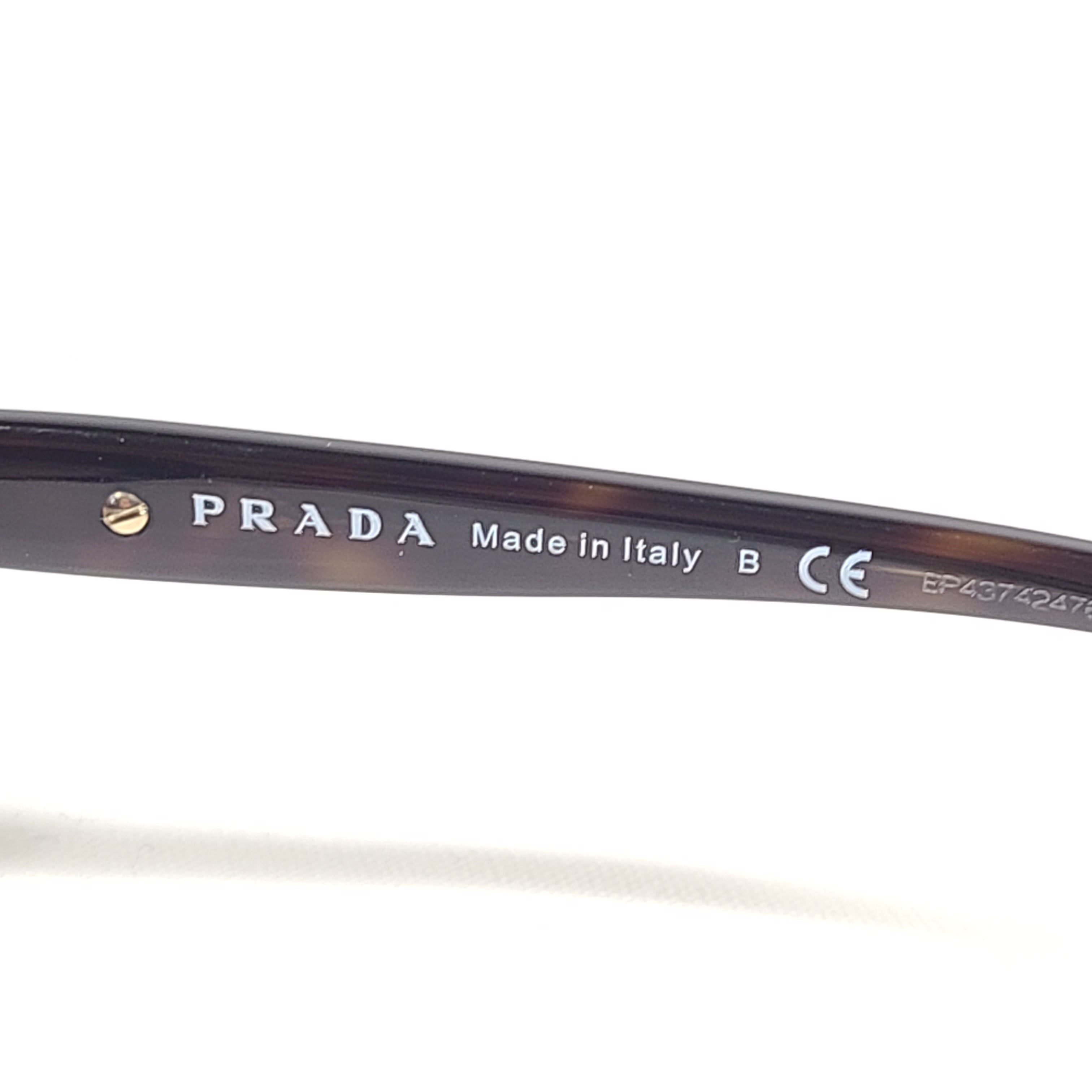 Prada SPR 080 tortoise brown butterfly-frame sunglasses with 57-17-130 sizing from Italy.