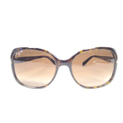 Prada SPR 080 tortoise brown butterfly-frame sunglasses with 57-17-130 sizing from Italy.