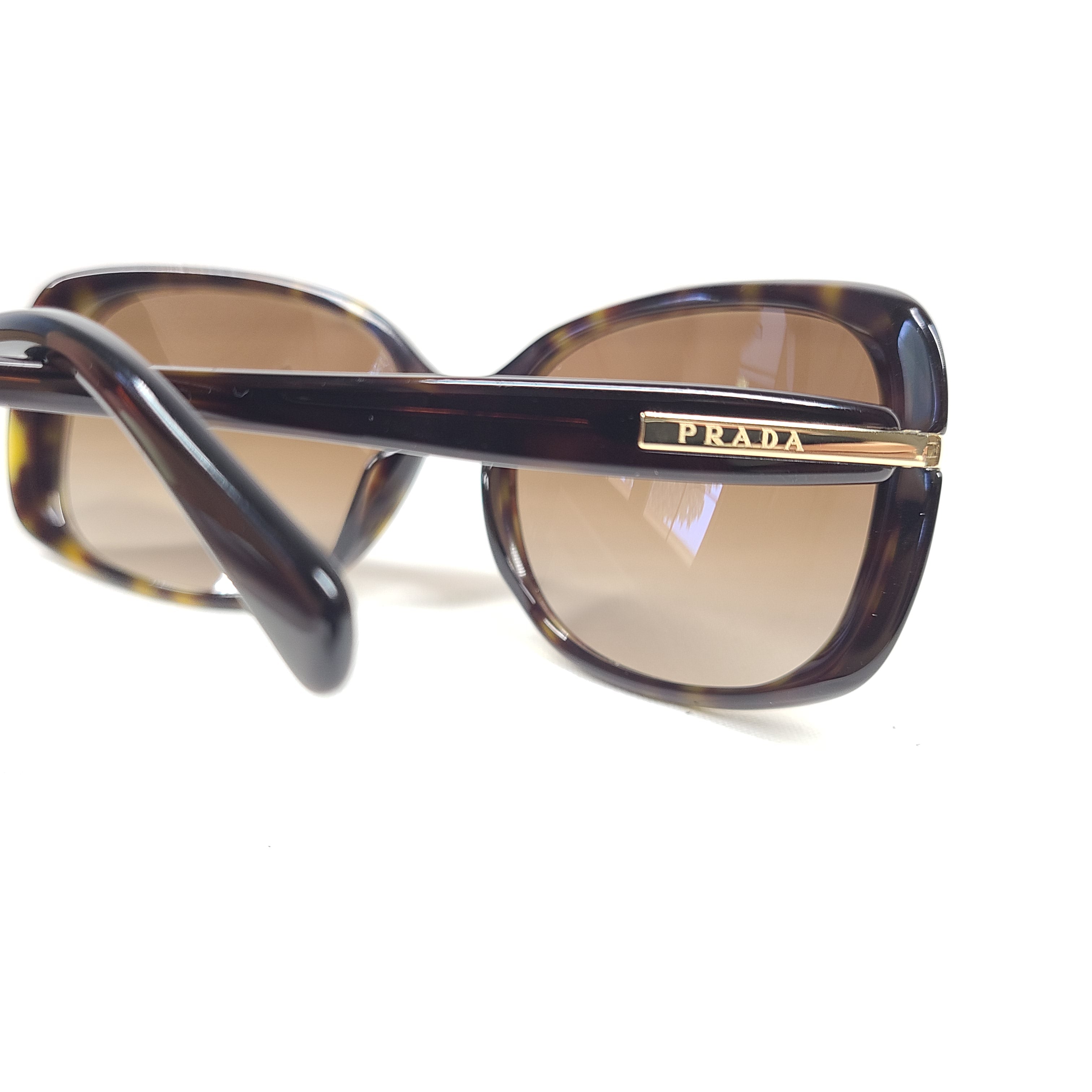 Prada SPR 080 tortoise brown butterfly-frame sunglasses with 57-17-130 sizing from Italy.