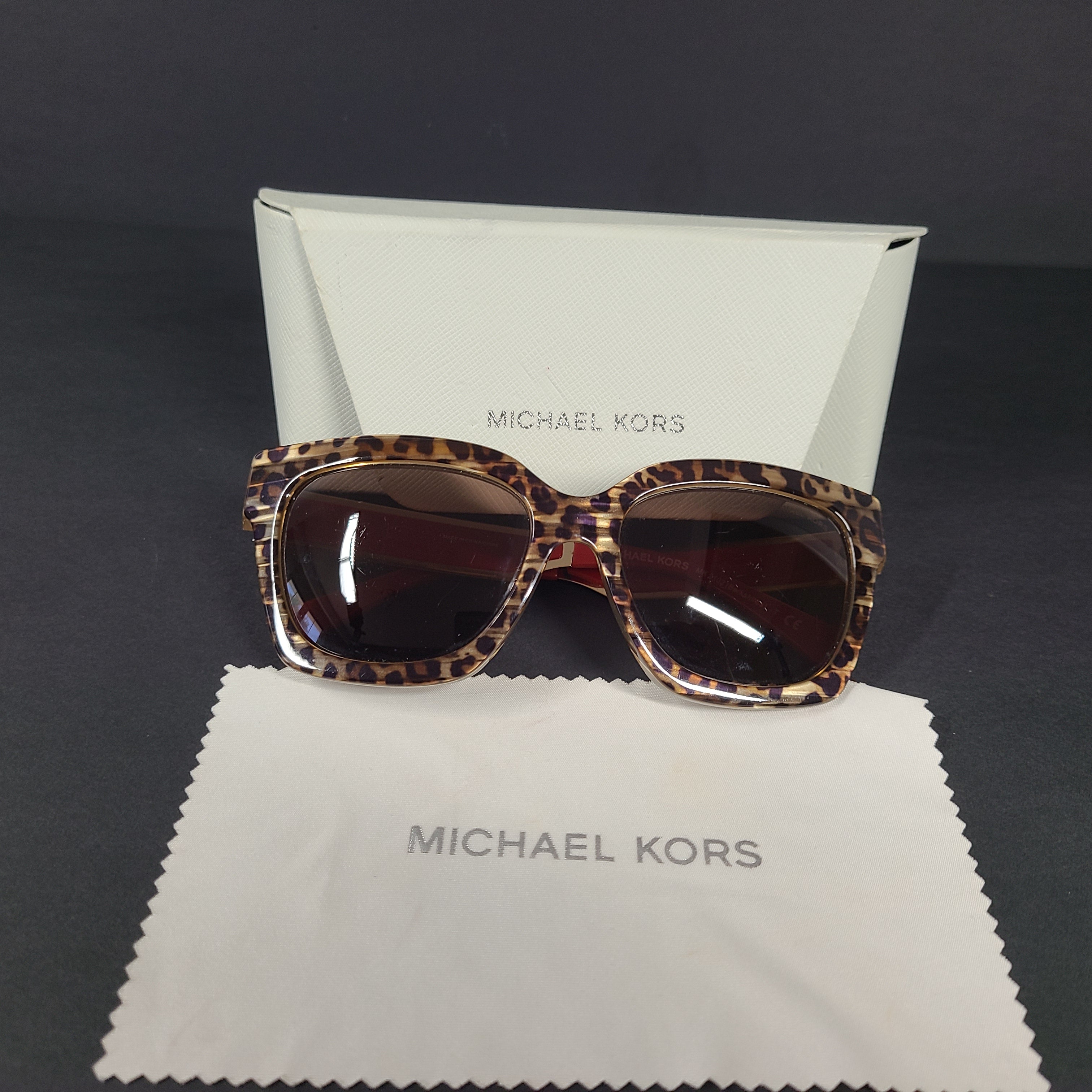 Michael Kors Berkshires MK-2102 leopard and red square sunglasses with logo-accent temples.