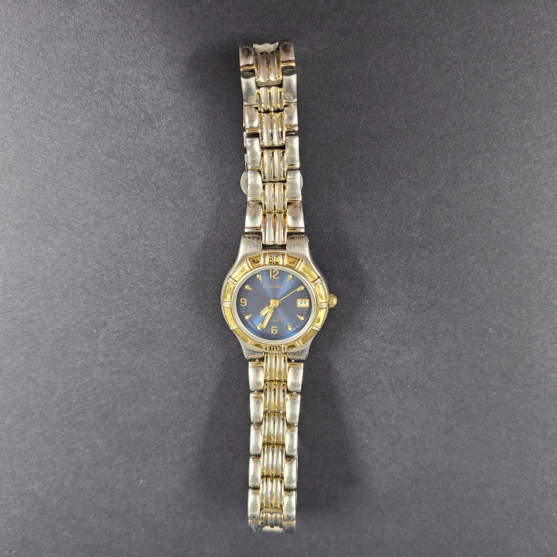 Two-tone Hugo Max wristwatch with 18K gold plating and stainless steel bracelet, model 85047.