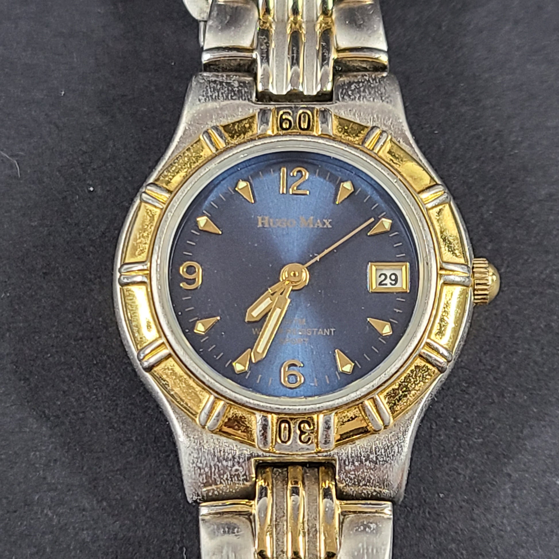 Two-tone Hugo Max wristwatch with 18K gold plating and stainless steel bracelet, model 85047.
