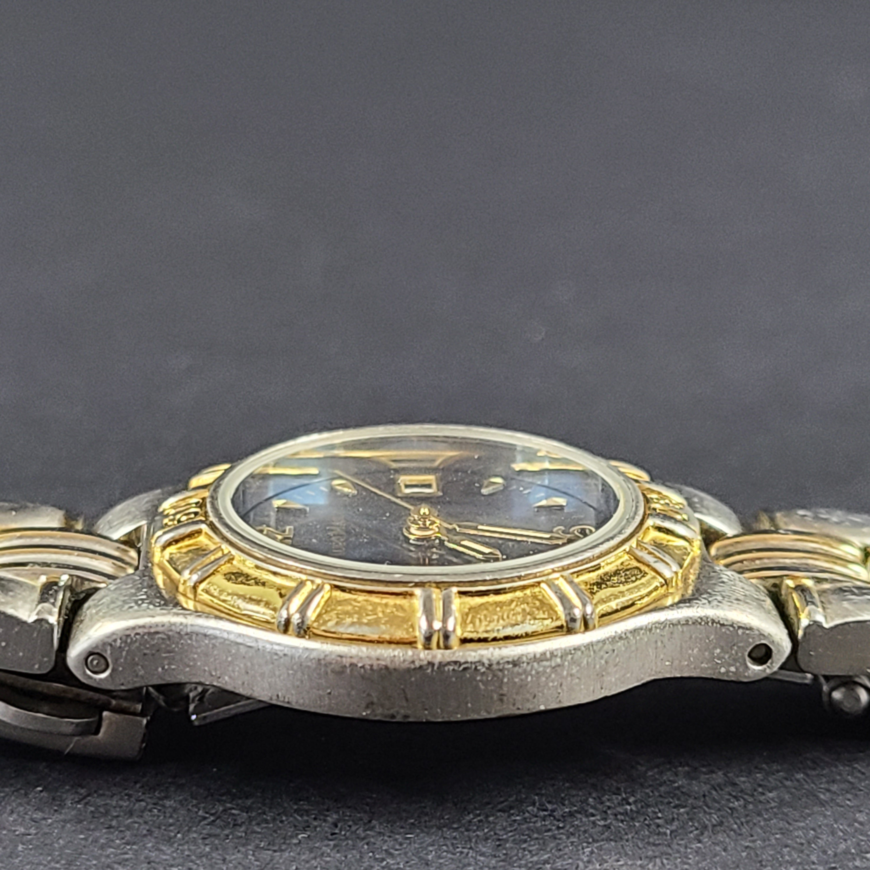 Two-tone Hugo Max wristwatch with 18K gold plating and stainless steel bracelet, model 85047.