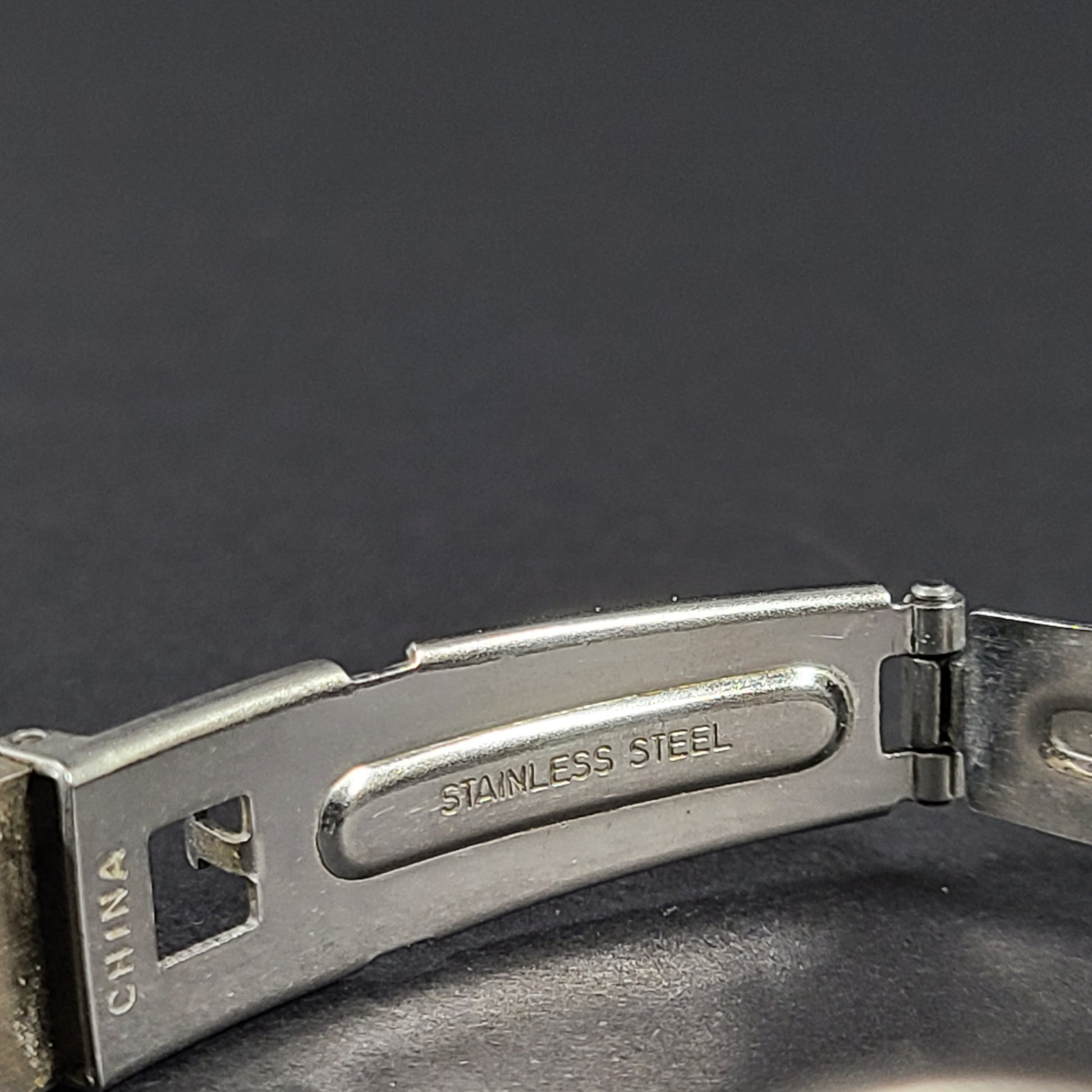 Two-tone Hugo Max wristwatch with 18K gold plating and stainless steel bracelet, model 85047.