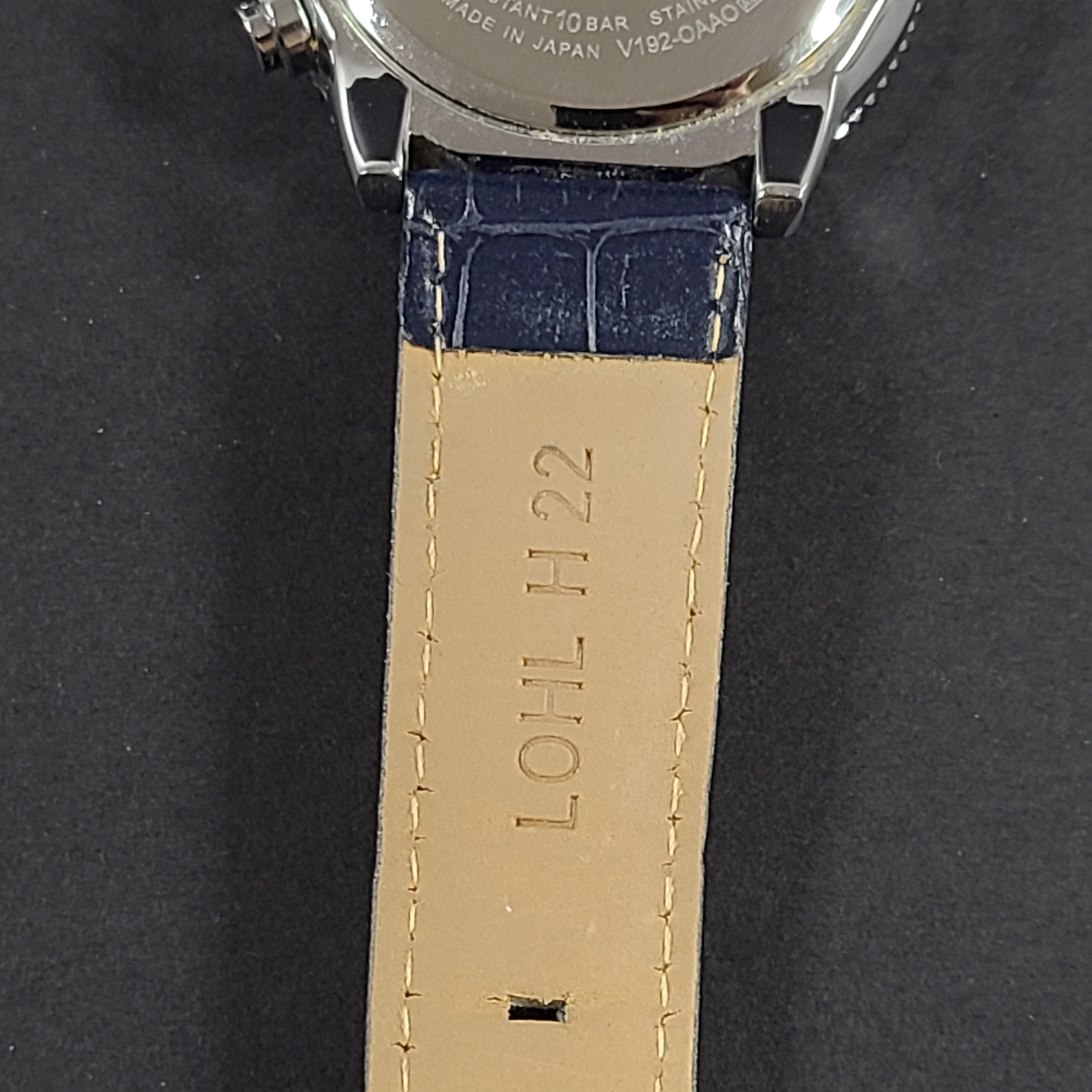 Seiko Prospex solar chronograph with blue dial and stainless steel case and bracelet.