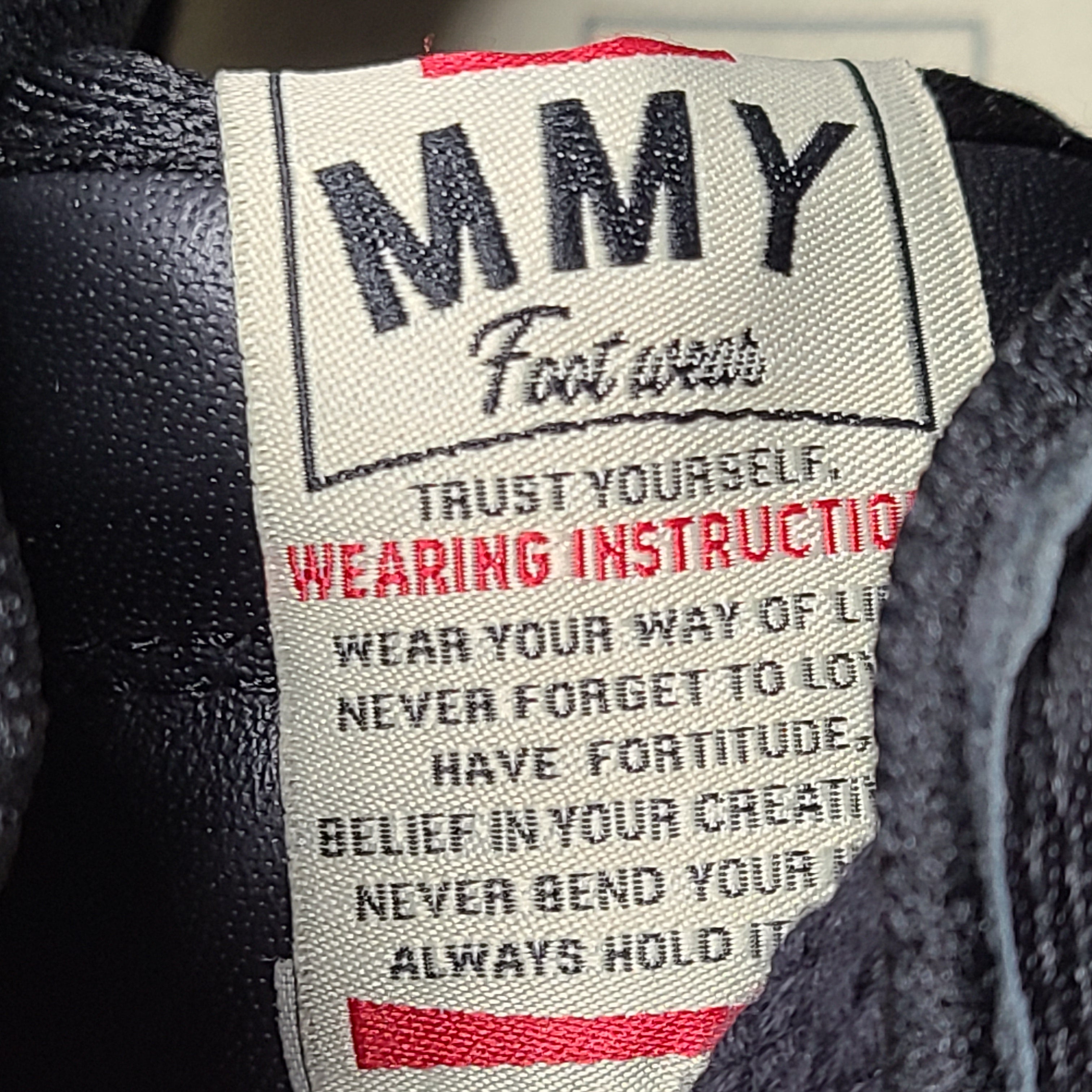 Black and white Maison Mihara Yasuhiro Wayne low-top leather sneakers with original sculpted OG sole and MMY branding.