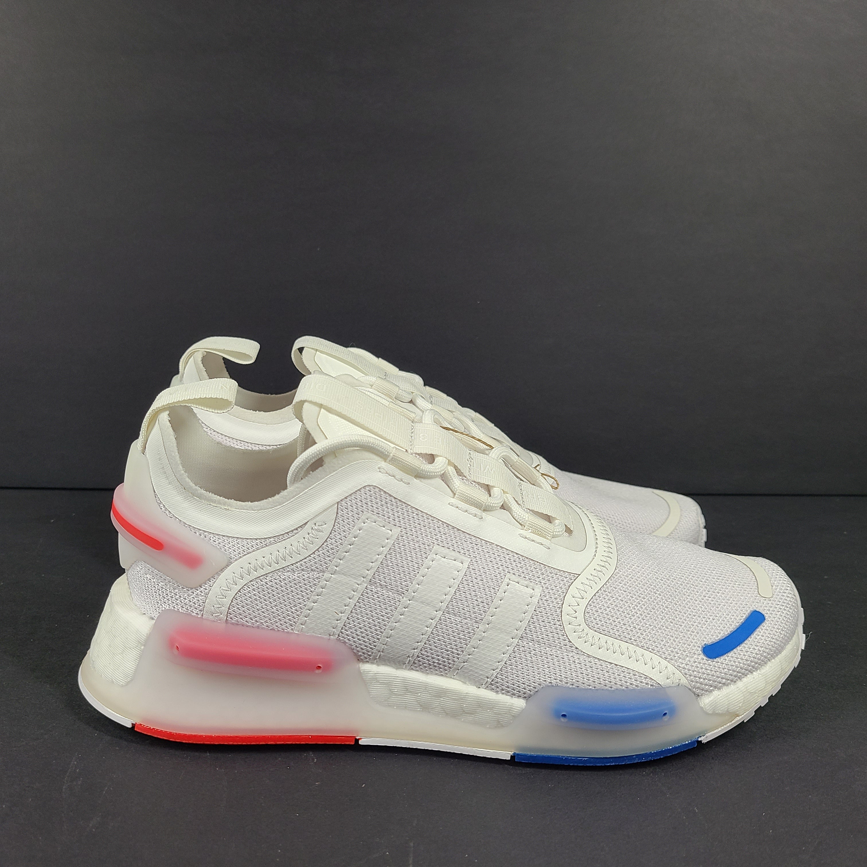 Adidas Parley multicolor low-top sneakers in US size 5.5 with white, red, and blue accents.