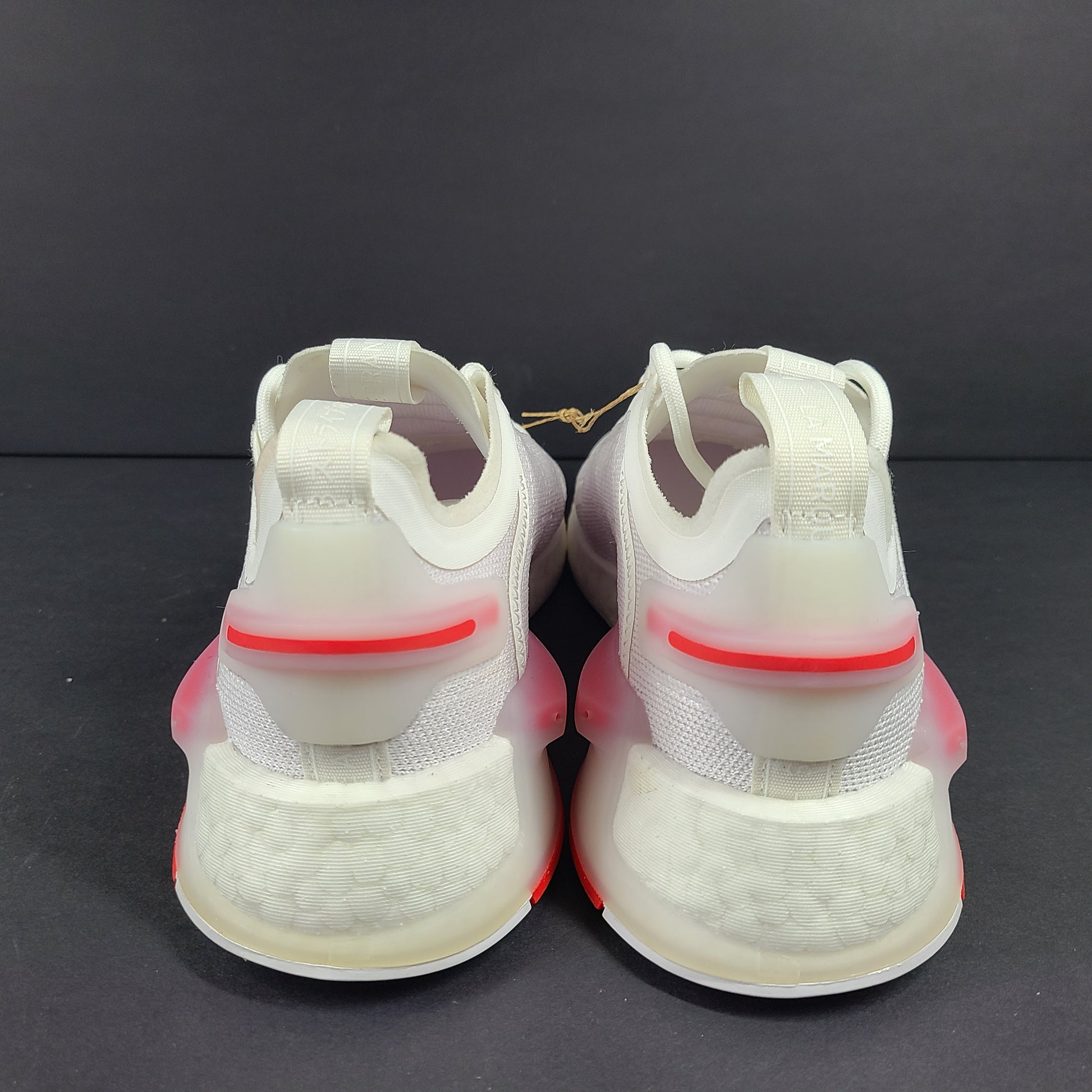 Adidas Parley multicolor low-top sneakers in US size 5.5 with white, red, and blue accents.