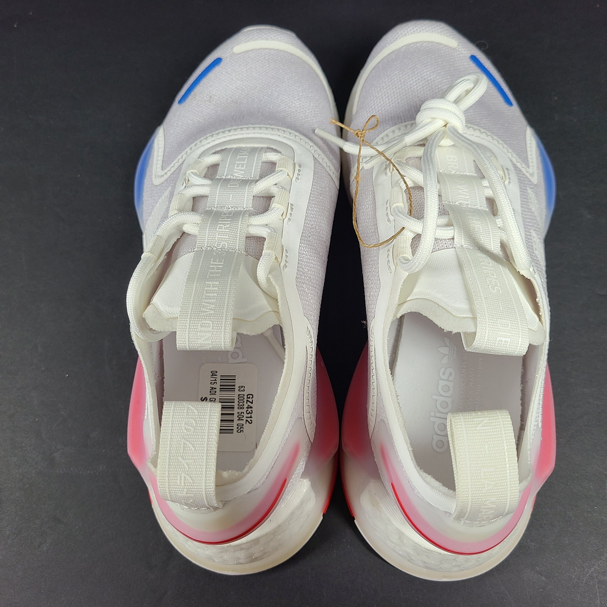 Adidas Parley multicolor low-top sneakers in US size 5.5 with white, red, and blue accents.