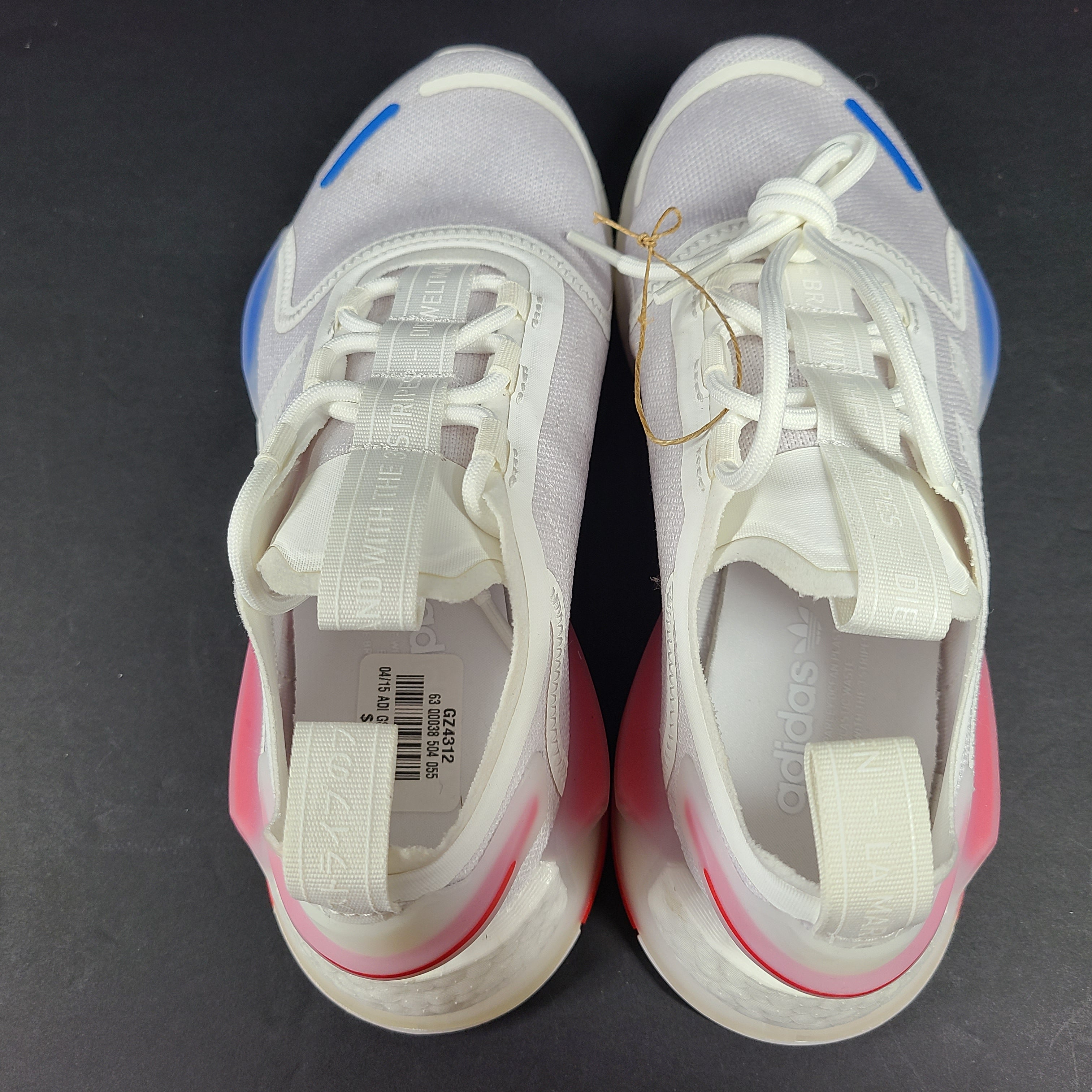 Adidas Parley multicolor low-top sneakers in US size 5.5 with white, red, and blue accents.