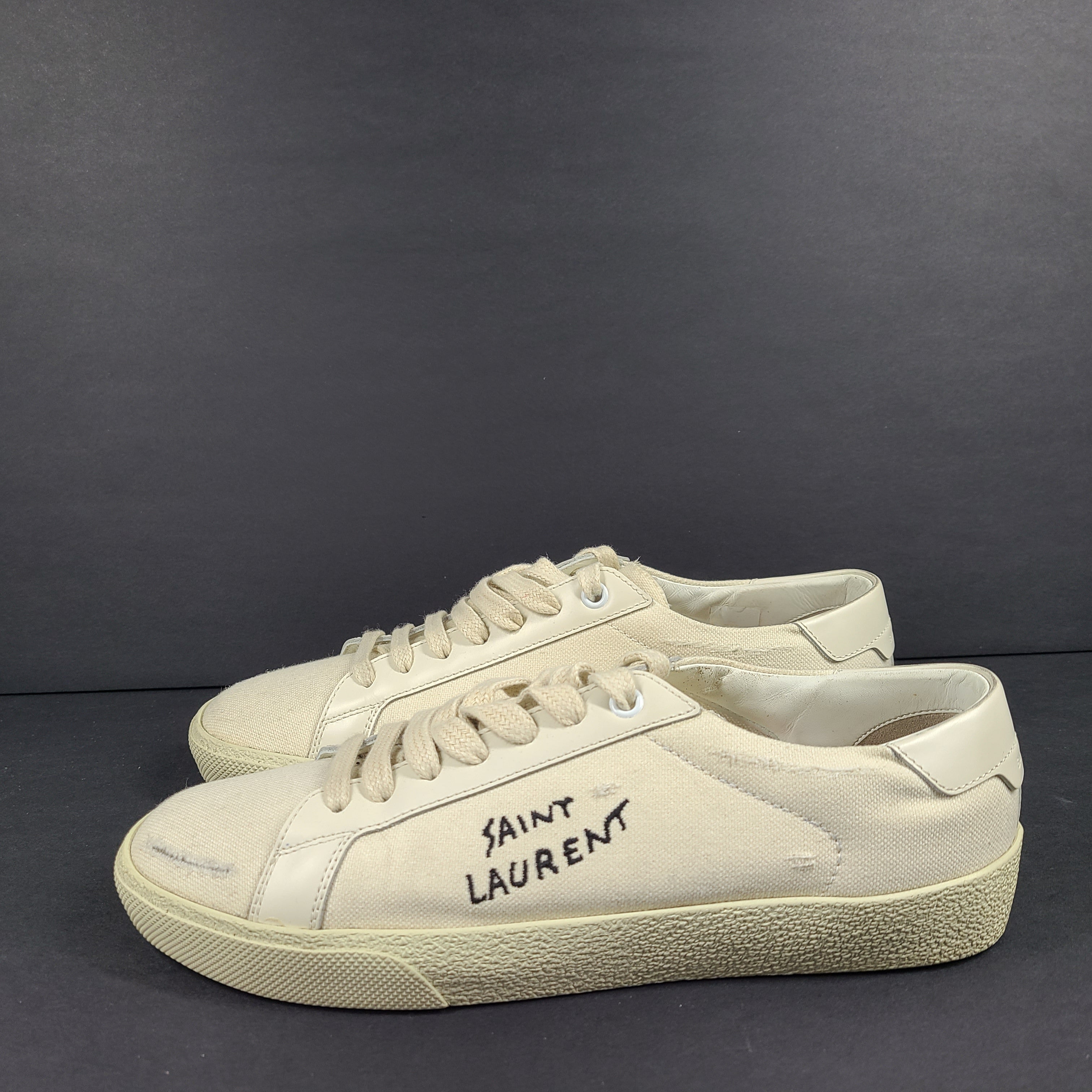 Beige Saint Laurent Court Classic SL/06 low-top sneakers with branded tongue and side text, EU 38½.