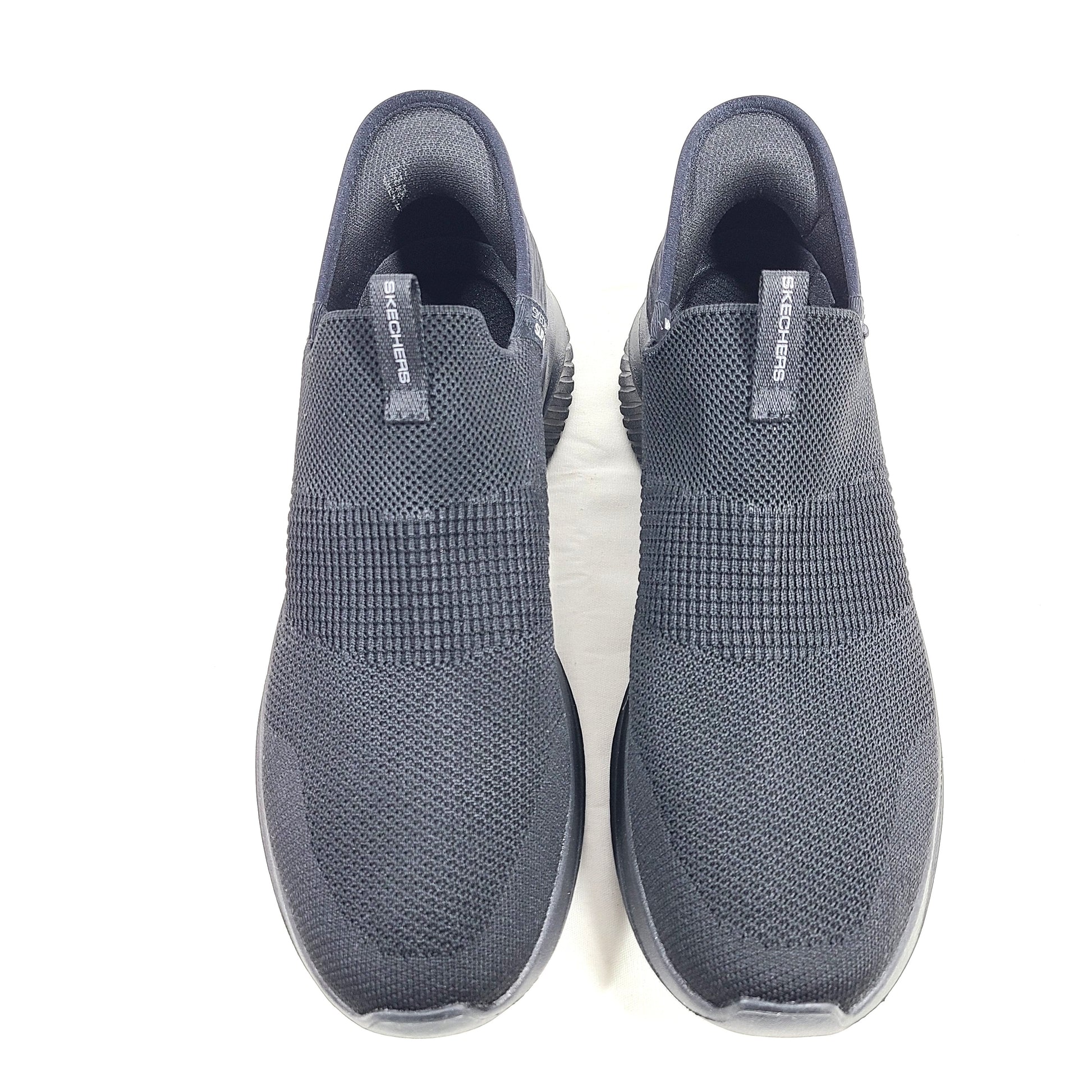 Black Skechers Slip-Ins Ultra Flex 3.0 men's slip-on shoes featuring knit upper and cushioned Air-Cooled Memory Foam for comfortable daily wear.