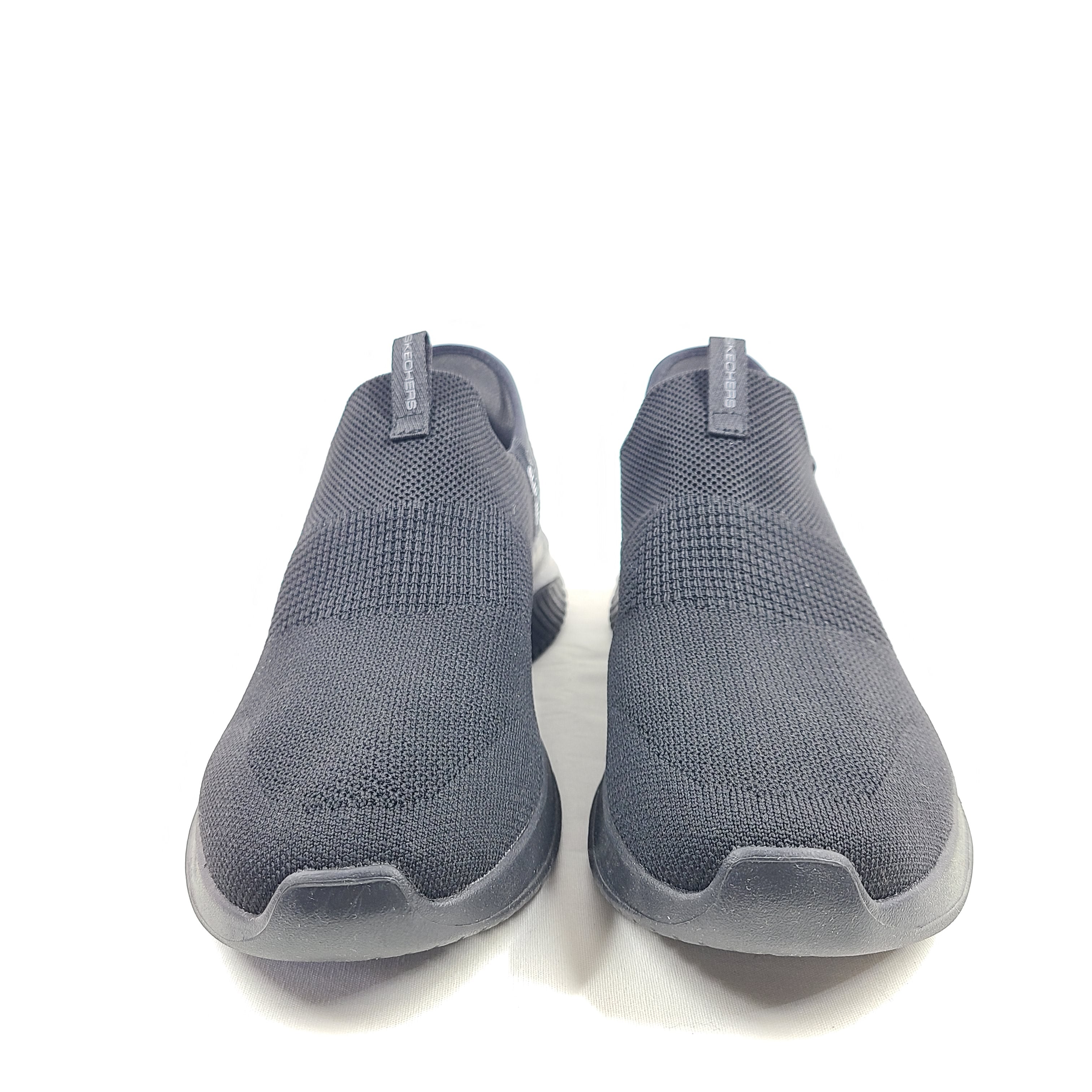 Black Skechers Slip-Ins Ultra Flex 3.0 men's slip-on shoes featuring knit upper and cushioned Air-Cooled Memory Foam for comfortable daily wear.