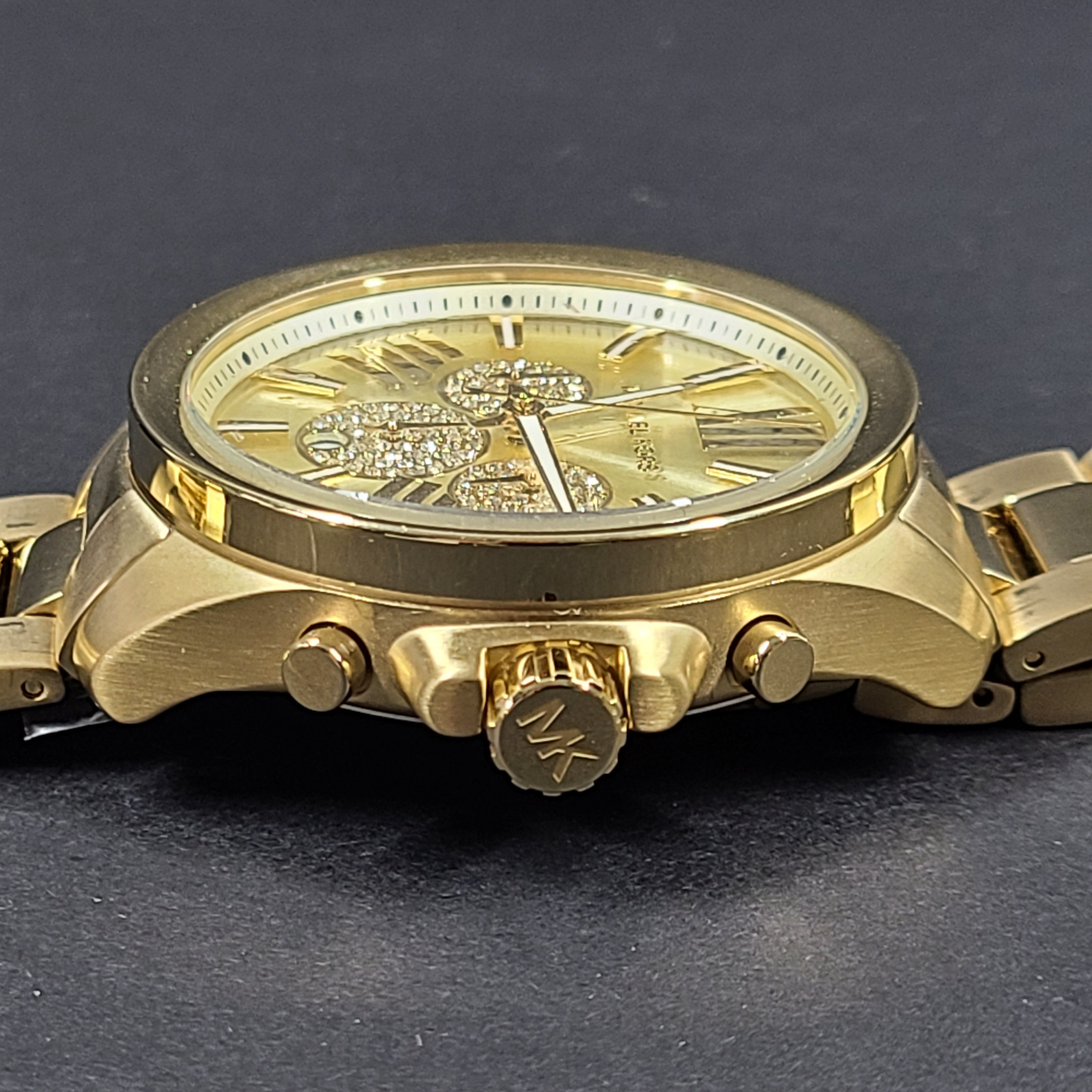 Gold-tone Michael Kors Wren chronograph watch with stainless steel bracelet and pavé sub-dials.