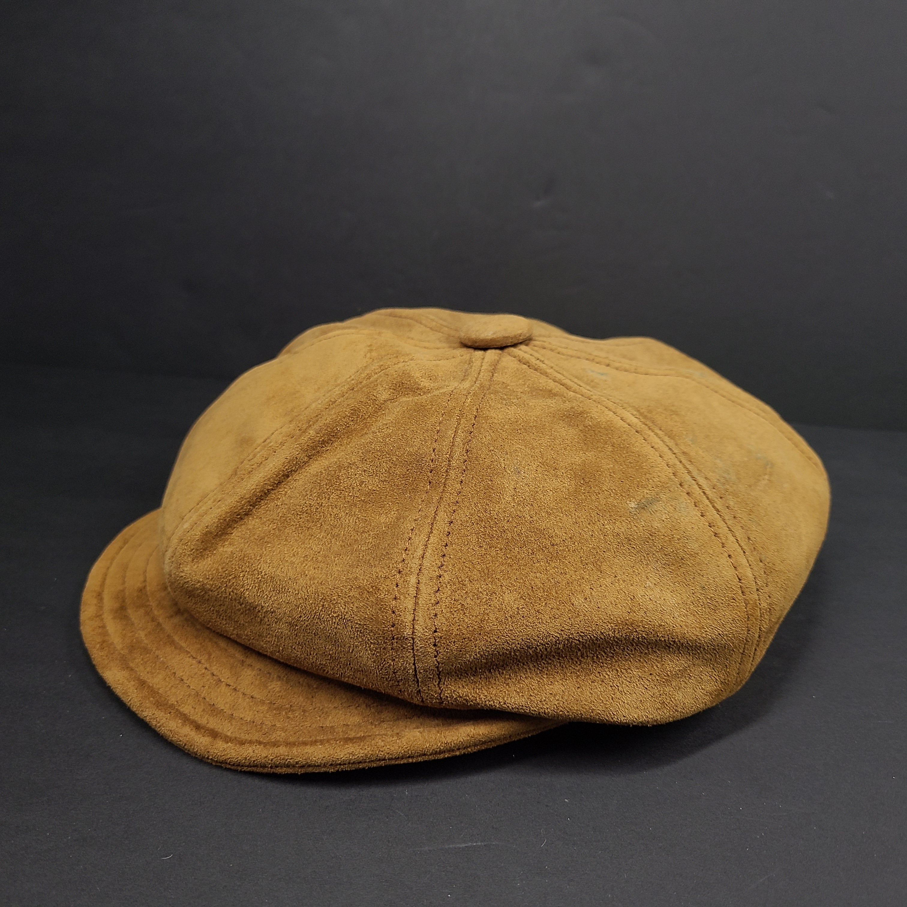 Goorin Bros medium brown suede cap with rounded crown and short brim.