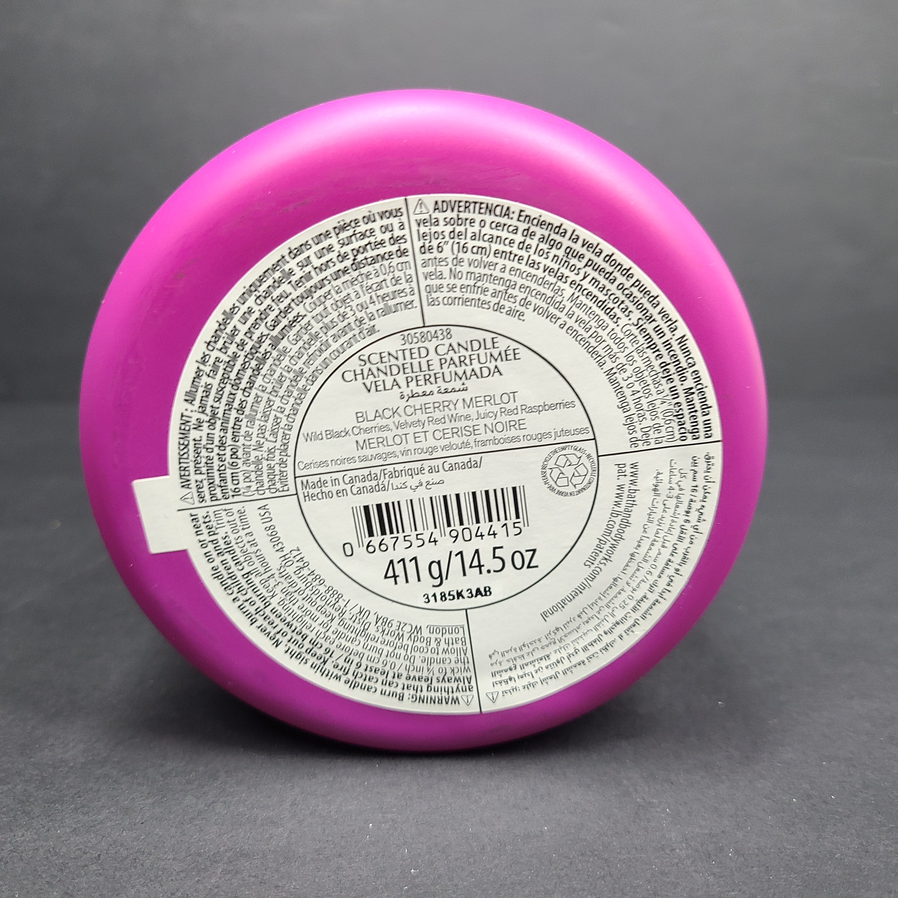 A 14.5 oz White Barn Cactus Blossom scented candle in pink with cactus flower, fresh citrus, and vanilla coconut notes.