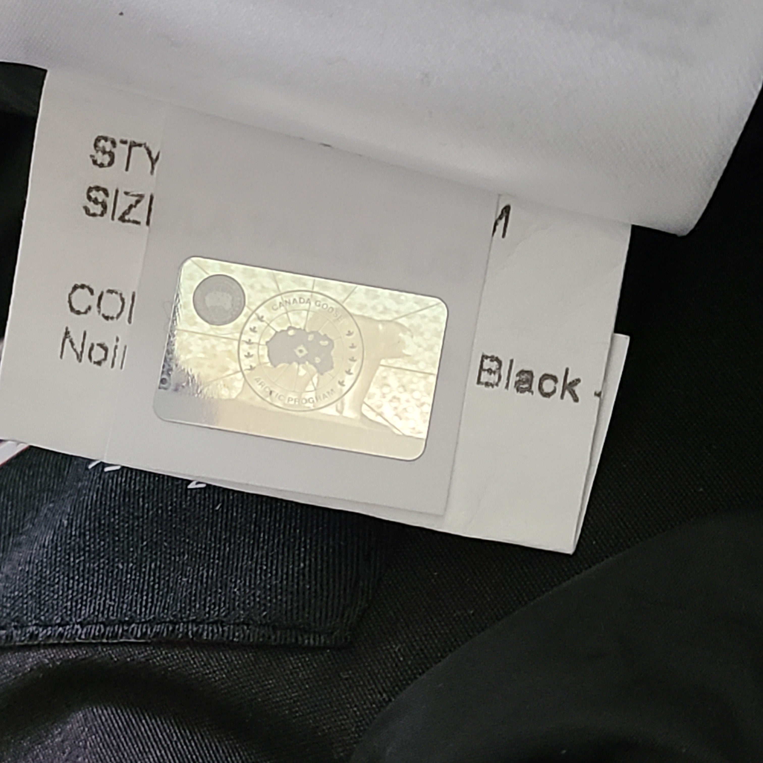 Black Canada Goose Arctic Program pants in large size with reinforced construction for cold conditions.