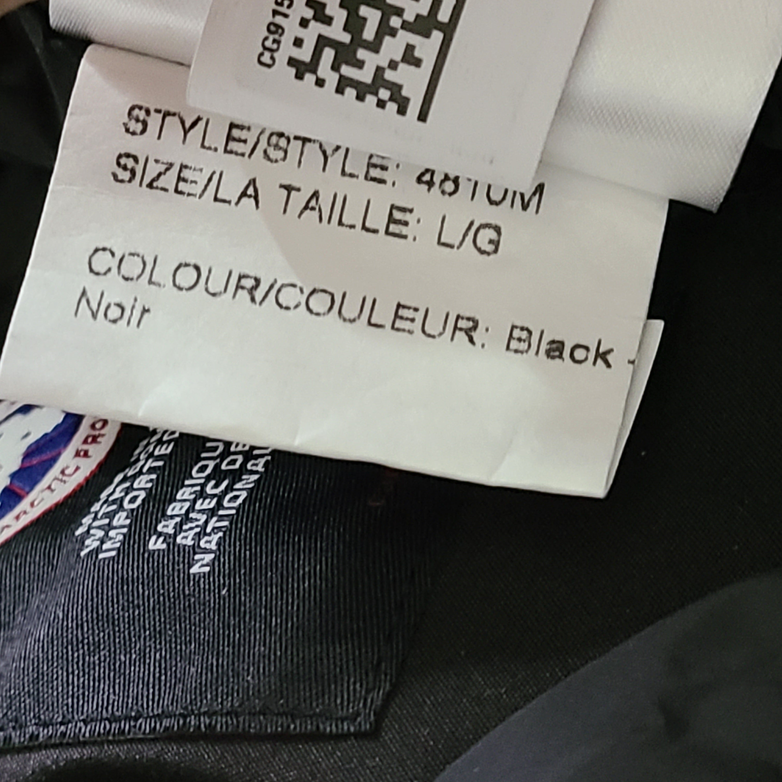 Black Canada Goose Arctic Program pants in large size with reinforced construction for cold conditions.