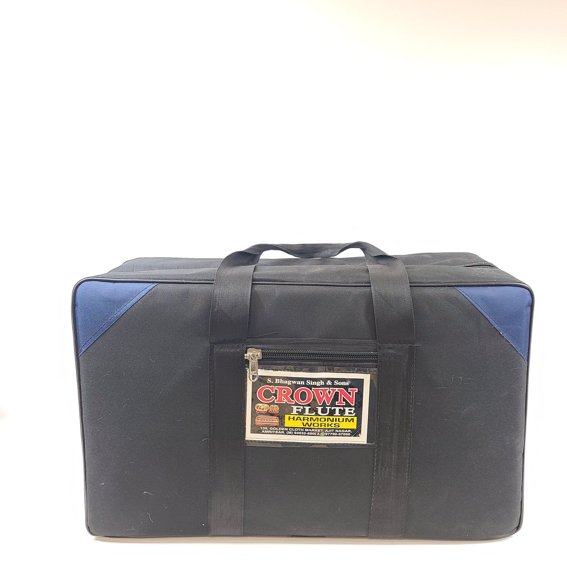 Classic S. Bhagwan Singh & Sons Crown Flute harmonium in black, blue, and brown with a carrying case included.