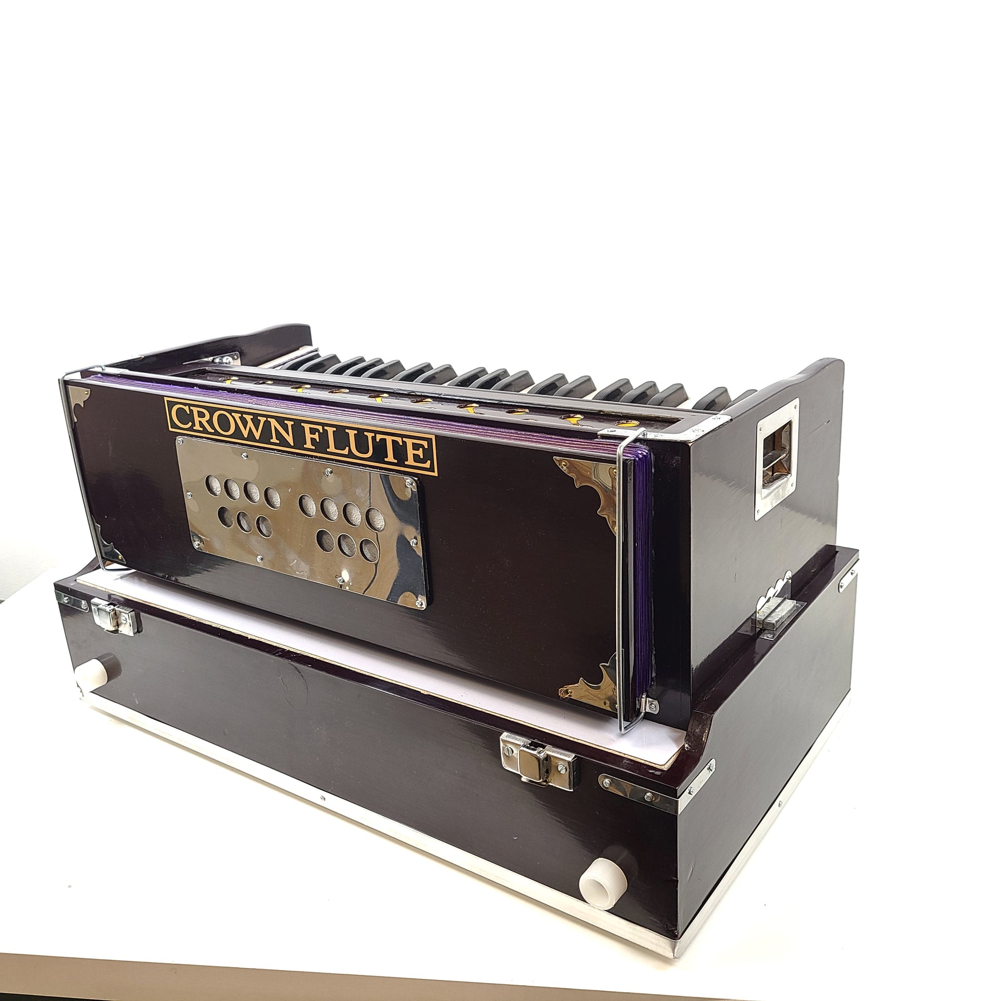 Classic S. Bhagwan Singh & Sons Crown Flute harmonium in black, blue, and brown with a carrying case included.