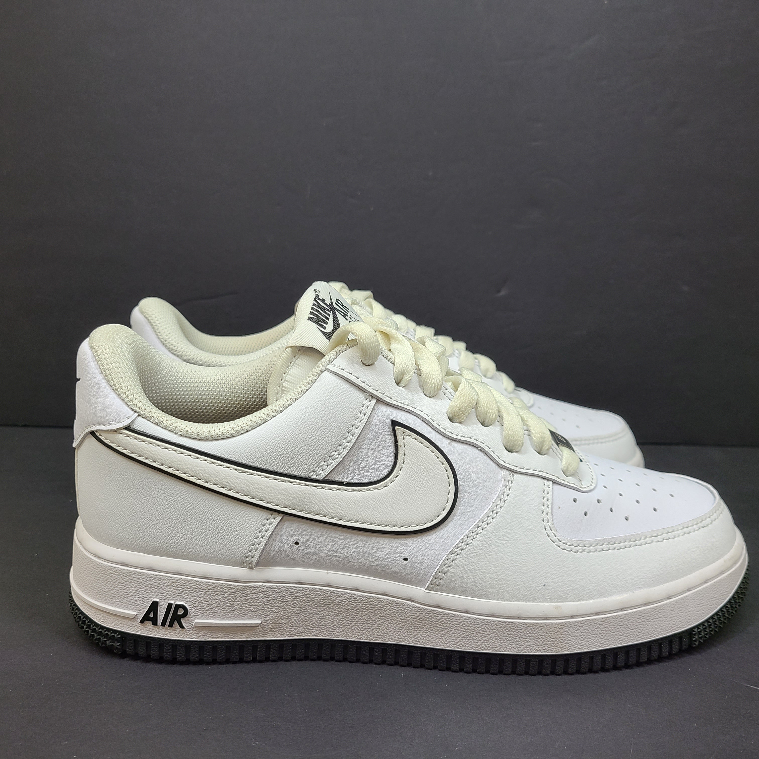 Classic Nike Air Force 1 Low in white with black accents, size US 7.5, model DV0818-103.