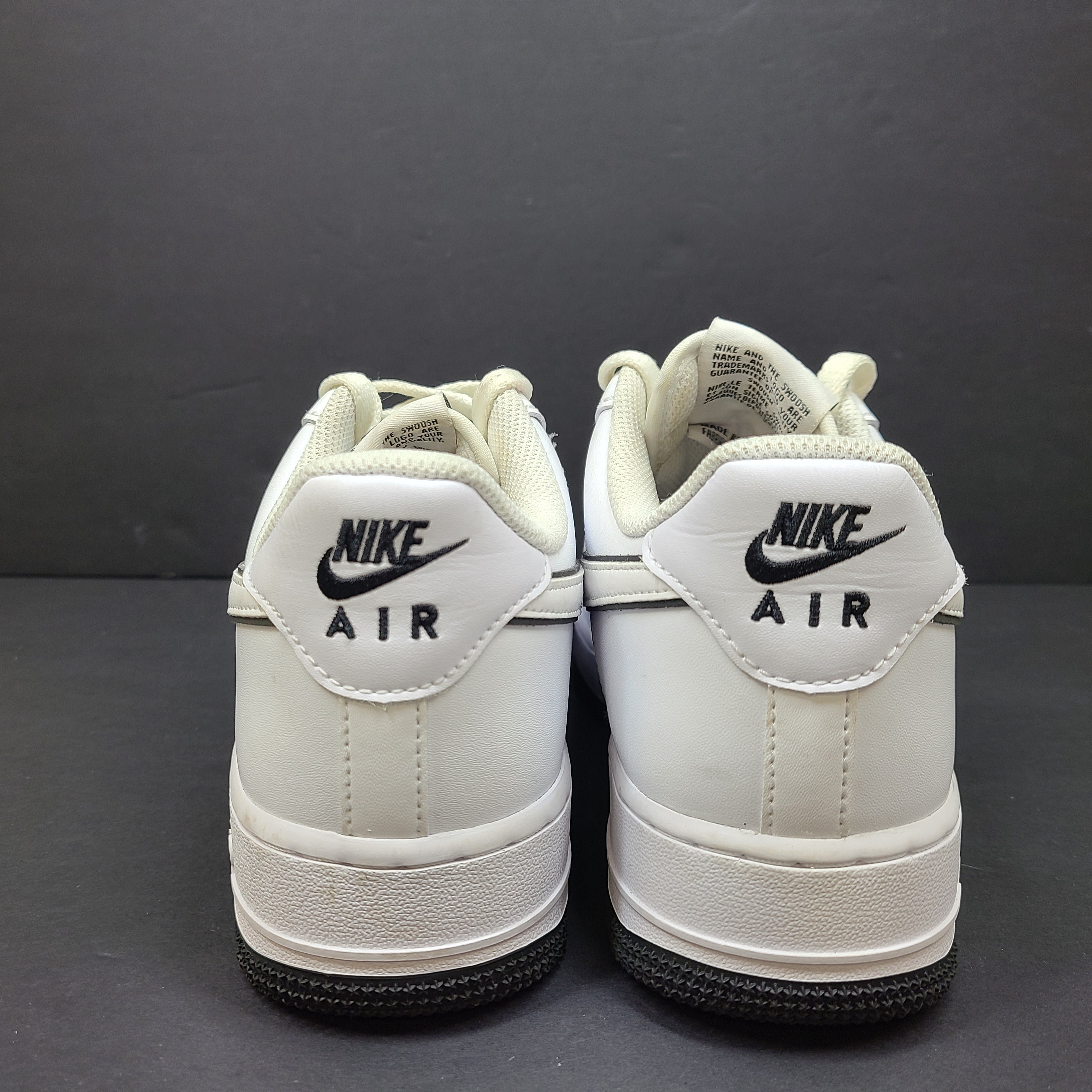 Classic Nike Air Force 1 Low in white with black accents, size US 7.5, model DV0818-103.