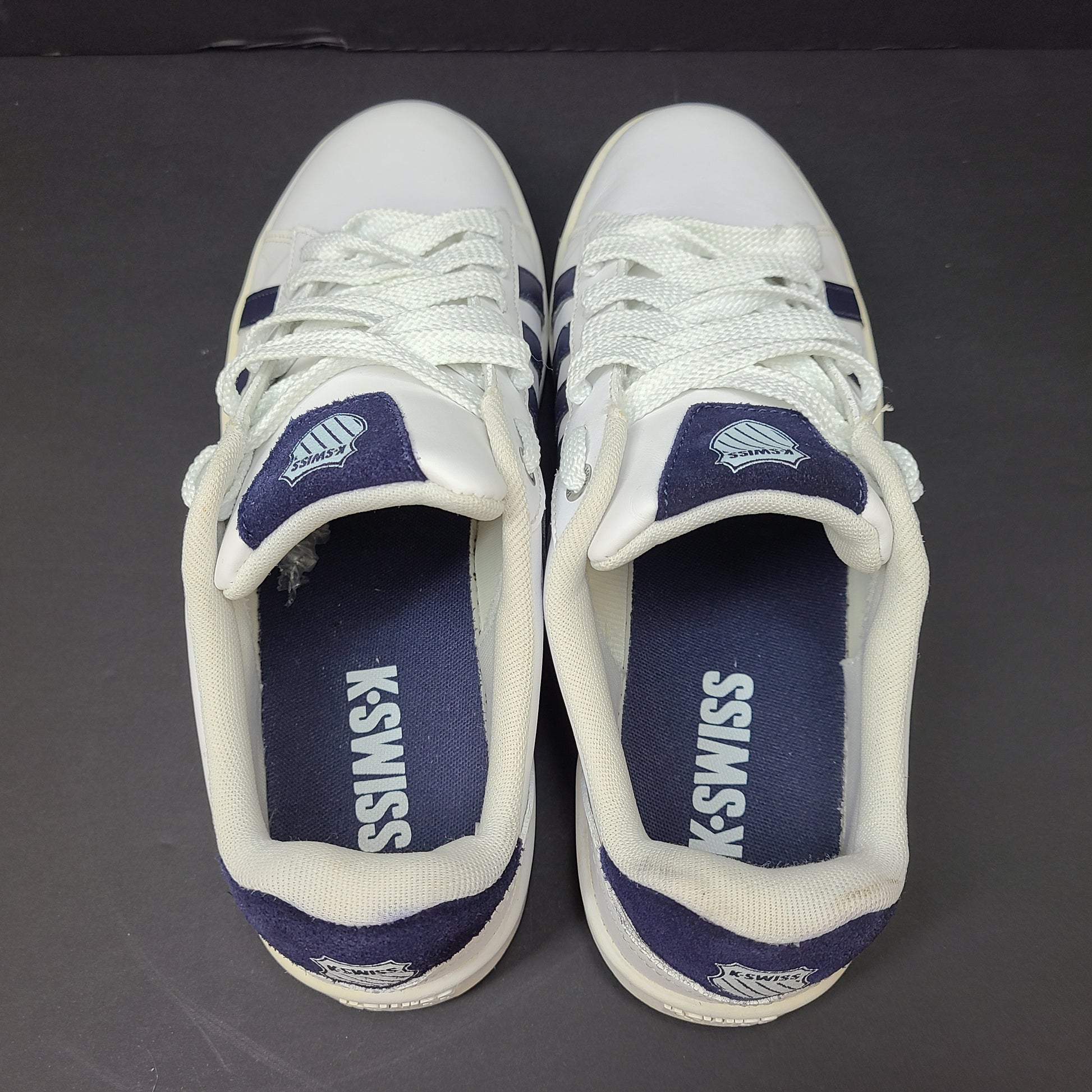 K-Swiss low-top men's sneaker in white and navy with branded tongue and heel.