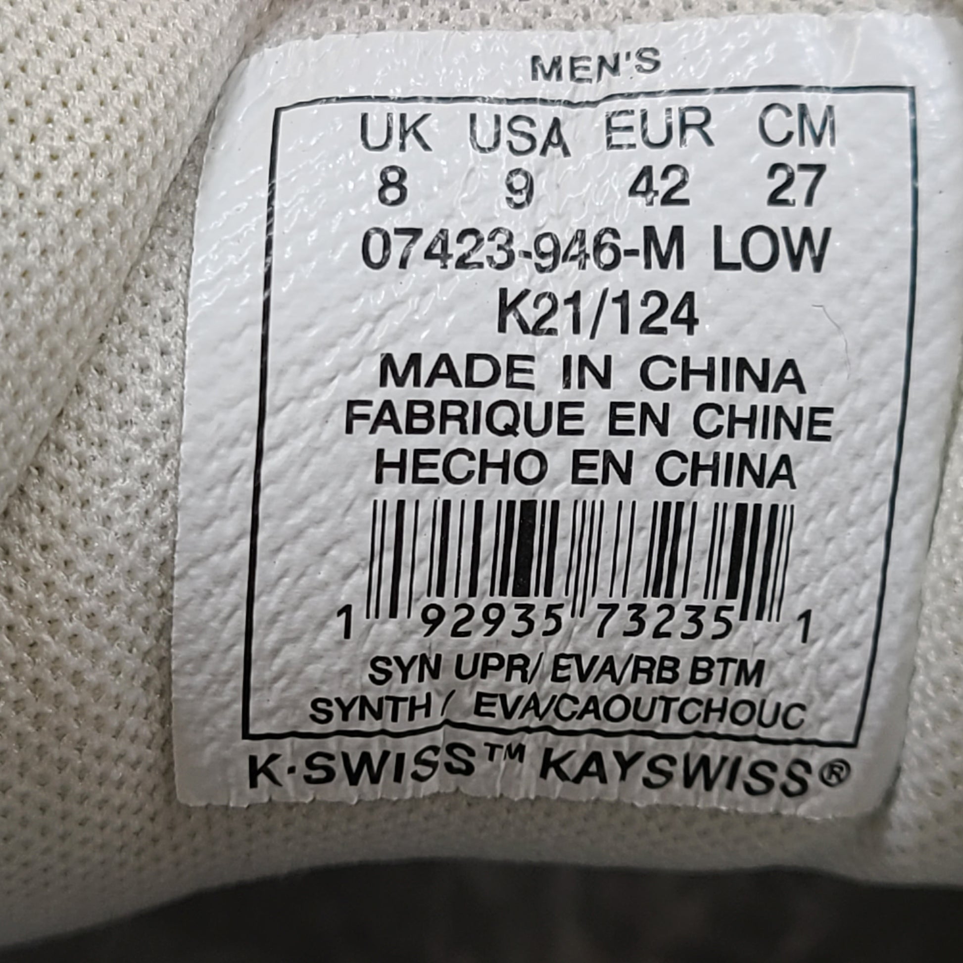 K-Swiss low-top men's sneaker in white and navy with branded tongue and heel.