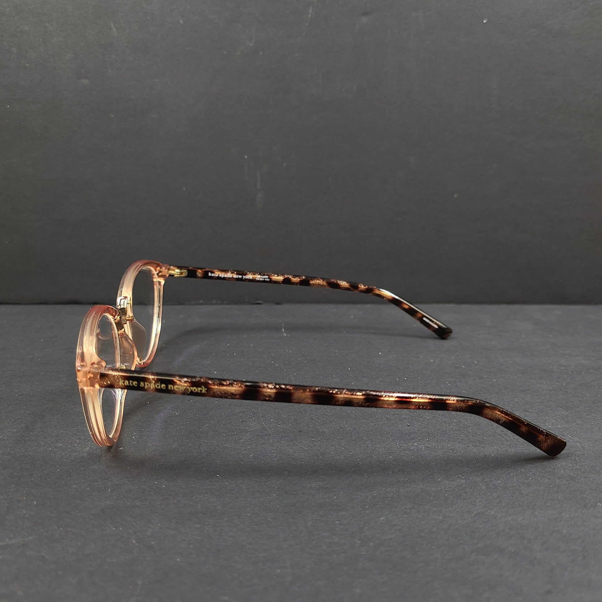 Kate Spade Emilia eyeglasses 2T3 140 in tortoise and peach with a branded arm inscription.